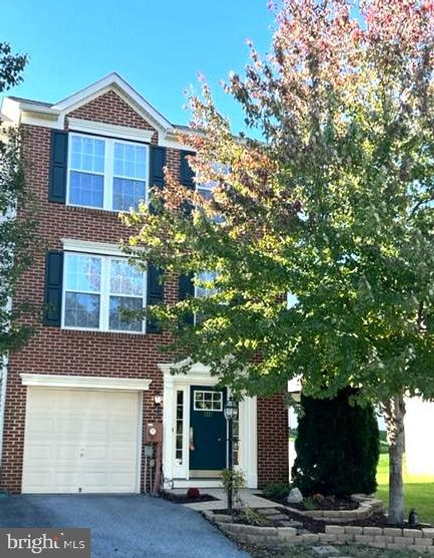 Freshly painted throughout & new flooring in this well appointed 3 bedroom, 2.5 bath end unit townhome offering 3 level bump out! First floor features spacious living room, fully equipped kitchen with island & pantry & eat-in area and morning room with electric fireplace. Follow upstairs to 3 bedrooms & 2 full baths; primary bedroom features cathedral ceiling & walk in closet & private bath. Finished basement level can be family room, exercise room, office, etc. Laundry area is there as well. Two tier deck, low maintenance vinyl fencing in back yard, shed, garage!