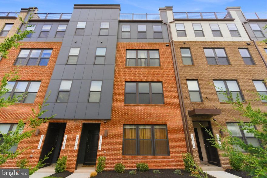 Modern luxury two-level condo in the heart of vibrant Ashburn, close to the Ashburn Metro Station. This residence offers a seamless blend of contemporary design and urban comfort. The Main Level offers an open-floor living space with a gourmet kitchen, quartz countertops, custom cabinets, recessed lights, window shades, curtain rods, stainless steel appliances, LVP flooring, a half bath, and a stylish kitchen backsplash.

The second level comprises a main suite with two walk-in closets and a double vanity, along with two guest bedrooms and an additional full bath. All bedrooms have lights, honeycomb blinds, and curtain rods. Guest bedrooms also fitted with ceiling fans. One of the bedrooms opens to a private balcony. An LG stacked washer & dryer unit is also available on the second level.

The front of the house opens to a community park area with lounge furniture, dining areas, a fire pit, outdoor gas grills & more. This unit comes with a single-car garage with a driveway, an EV electric car charger, and epoxy flooring. The entire home is freshly painted.