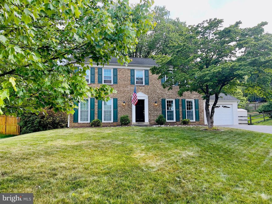 This is the one you have been waiting for! Move right in and enjoy your summer relaxing and entertaining! Located on a quiet cul-de-sac with a pretty patio and fenced backyard, this home has been meticulously maintained and updated and offers something for everyone.  Please note the recent hardwood floors throughout the main level, and updated table space kitchen with custom cherry cabinets, stainless steel appliances, recessed lighting, luxury vinyl flooring and Corian counter tops. The main level family room includes a wood burning fireplace with decorative mantel and exposed wood beams. The convenient mud room off the garage has washer and dryer hook ups and can be converted into a main level laundry room. The upper level boasts fresh paint, recent neutral carpet, updated hall and primary baths, and ceiling fans in all four spacious bedrooms. The huge primary suite has a walk in closet with organizers, dressing/vanity area and updated bath. The fully finished lower level has fresh paint and endless possibilities.