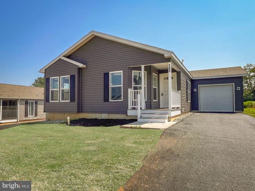 This well appointed two bedroom home is absolutely stunning.  Starting with the large eat-in kitchen and tile backsplash, separate dining room for large family gatherings, rounded archways for that more craftsman style look and finishing with the spacious main suite.  We have included a private entrance off the master bedroom leading to a concrete patio for that morning coffee.  The attached 12X24 garage adds more storage to this already spacious home.  A must see!