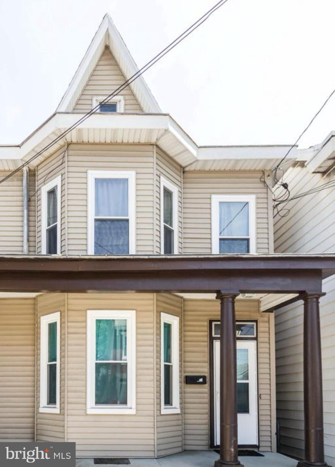 Welcome to 421 N Hanover St, a beautifully maintained 3-bedroom, 1.5-bath townhome offering 1,687 square feet of living space in a prime downtown Carlisle location. This spacious and inviting home blends timeless character with everyday comfort—perfect for homeowners, investors, or those seeking walkable small-town living.
Step inside to find high ceilings, large windows, and hardwood flooring that reflect the historic charm of the property. The main floor features a generous living and dining area, a convenient half bath, and a well-sized kitchen with ample cabinetry and room to make it your own.
Upstairs, you’ll find three spacious bedrooms and a full bath, ideal for families, guests, or a home office setup. The full basement offers additional storage or potential for workspace, and the walk-up attic provides even more flexibility