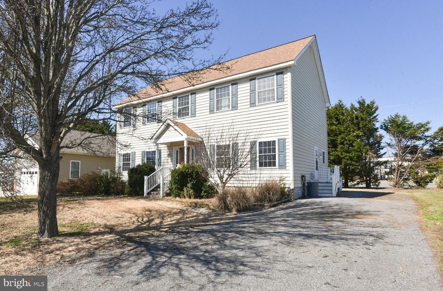 Built in 2003  * Center Hall Colonial with wood floors, fireplace in living room * 4 Bedrooms 3 Full baths * Huge kitchen with slider to back deck *  1st  floor offers Living room, separate dining room, den-which was used as  bedroom #5, Laundry, Full bath, Huge kitchen with pantry * 2nd floor features 4 bedrooms 2 full  incredible baths * Don't miss the dressing room off the primary bedroom * Lots of natural light  thru-out *  Location is extraordinary * Community pool  and low HOA fees * Updates include : 2 new HVAC systems (one on each level), Roof and Tankless water heater , ceiling fans, large  shed in back yard *