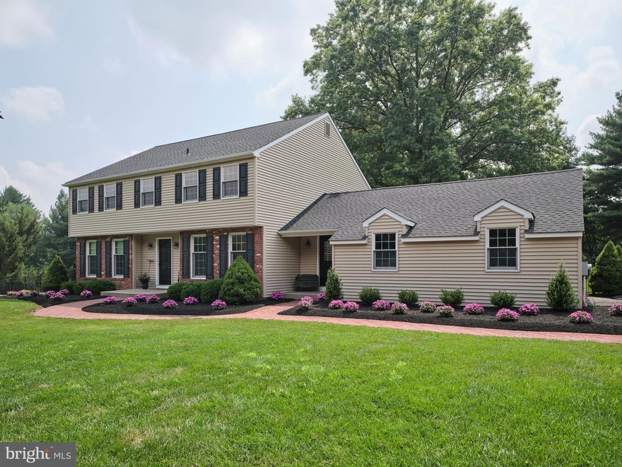 Welcome to this quintessential Bucks County gem nestled on a peaceful cul-de-sac in the highly sought-after Pebble Hill neighborhood. This stunning home sits on a flat 0.92-acre lot, surrounded by lush evergreens, providing year-round privacy and creating a harmonious blend of timeless charm and modern upgrades. Meticulously renovated with no expense spared, every corner of this residence showcases attention to detail. As you step inside, you'll immediately feel the warm and inviting ambiance created by the shiplap walls and exposed beams lending to a rustic yet elegant atmosphere. The first floor has been tastefully upgraded with new flooring, doors, and contemporary lighting, elevating the living spaces to a new level of sophistication. The Living Room is adorned with Roman shades on its windows, and just across the large center hall is a spacious Dining Room that is perfect for hosting large gatherings. Culinary enthusiasts will be delighted with a seamless cooking experience in the kitchen and adjoining breakfast room. Quartz countertops, tile backsplash, farmhouse sink, and top-of-the-line Whirlpool appliances are among the exceptional features. Additional functional and stylish elements include a trash compactor and a butcher block island. The kitchen opens to the Family Room, where built-in bookcases flank a brick fireplace converted to a wood pellet stove and a new chimney liner for energy efficiency resulting in lower heating bills. Adding to the home, the back patio was enclosed in 2022 and offers year-round enjoyment with its own HVAC mini-split system. Rounding out this level is a conveniently located powder room, plus a large mudroom with laundry and separate outside and garage entrances. As you ascend the turned staircase, you'll discover four spacious bedrooms with ample closet space, each exuding comfort and tranquility. Both the primary bathroom ensuite and the hall bathroom have undergone complete remodeling, boasting new fixtures, quartz vanities, and new flooring. The outdoor space of this property is equally impressive. The newly installed Eco-finish paver patios overlook the fenced backyard oasis. Here, an Anthony Sylvan heated pool awaits, offering the perfect spot for relaxation and entertainment. Your pool experience is further enhanced with a new propane heater and automatic cleaner. Ample storage for pool, lawn, and gardening equipment are available with a 10’ x 16’ dedicated pool shed and a 14’ x 24’ outbuilding, with room for another car! The unfinished basement has been upgraded with glass block windows and LED lighting. This home prioritizes efficiency and comfort, boasting a newer HVAC system with three heat and two AC zones, updated ductwork, and blown-in insulation in the attic. The home's exterior is equally impressive, with a brand-new roof in July and newer vinyl siding and shutters. During this project, the entire house was wrapped around the perimeter with Tyvek and Celetex insulation. Energy efficiency is also ensured with a complete window replacement with Anderson 400 series, and all exterior doors have been replaced with Pella Doors. The electric panel has been upgraded to 200 amps, plus a new well tank, water neutralizer, and UV light system was added. In 2022, new oil tanks were installed, and plans are underway for a new in-ground septic system. In addition to the charm and efficiency, this home boasts easy access to major commuter routes and train station. Historic Doylestown Borough, offering shopping, dining, and cultural events, is just a quick 5-minute drive away.  Located in the award-winning Central Bucks School District with prestigious private schools nearby. Don't miss the chance to make this exquisite Bucks County property your own!