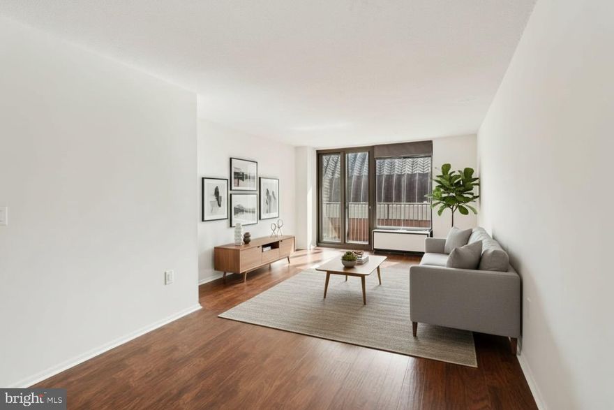 Enjoy Center City living in this bright,  move-in-ready, one-bedroom, one-bath condo at 1420 Locust St, Unit 7O. This 726 sq ft residence features a freshly renovated kitchen with Shaker-style cabinetry, dark countertops, newer appliances, and sleek black hardware that pair perfectly with the modern feel of the space. The open living and dining area offers hardwood flooring and sliding glass doors leading to a private balcony with southern light and views of the Kimmel Center. The spacious bedroom includes two walk-in closets and the upgraded bathroom showcases a white subway tile tub/shower, dark vanity, and contemporary fixtures. A stacked washer and dryer are conveniently located inside the unit. The Academy House is a full-service, secure condominium building with a 24-hour concierge desk, fitness center, indoor pool and spa, and a residents’ community room. HOA fees include all utilities—electric, heat, air conditioning, water, and basic cable. Located in the heart of Center City Philadelphia, this home is surrounded by shopping, world class dining, and top entertainment. Stroll 0.15 mi to the Kimmel Cultural Campus, Coffee Shops, Whole Foods, Trader Joes, and more, or catch a quick ride from the Broad Street Line or PATCO just two blocks away. Jefferson Hospital and Rittenhouse Square are both under half a mile. If you are looking for a home base near the city’s cultural core and a turn-key residence with top amenities, Unit 7O delivers style, convenience, and unbeatable location. Perfectly situated in the Rittenhouse/Avenue of the Arts area, this pet-friendly home at the ACADEMY HOUSE is just steps away from fine dining, one-of-a-kind shopping, world-renowned cultural destinations, and exciting nightlife. All major public transport lines - SEPTA, PATCO, MFL, and BSL, right at your doorstep!