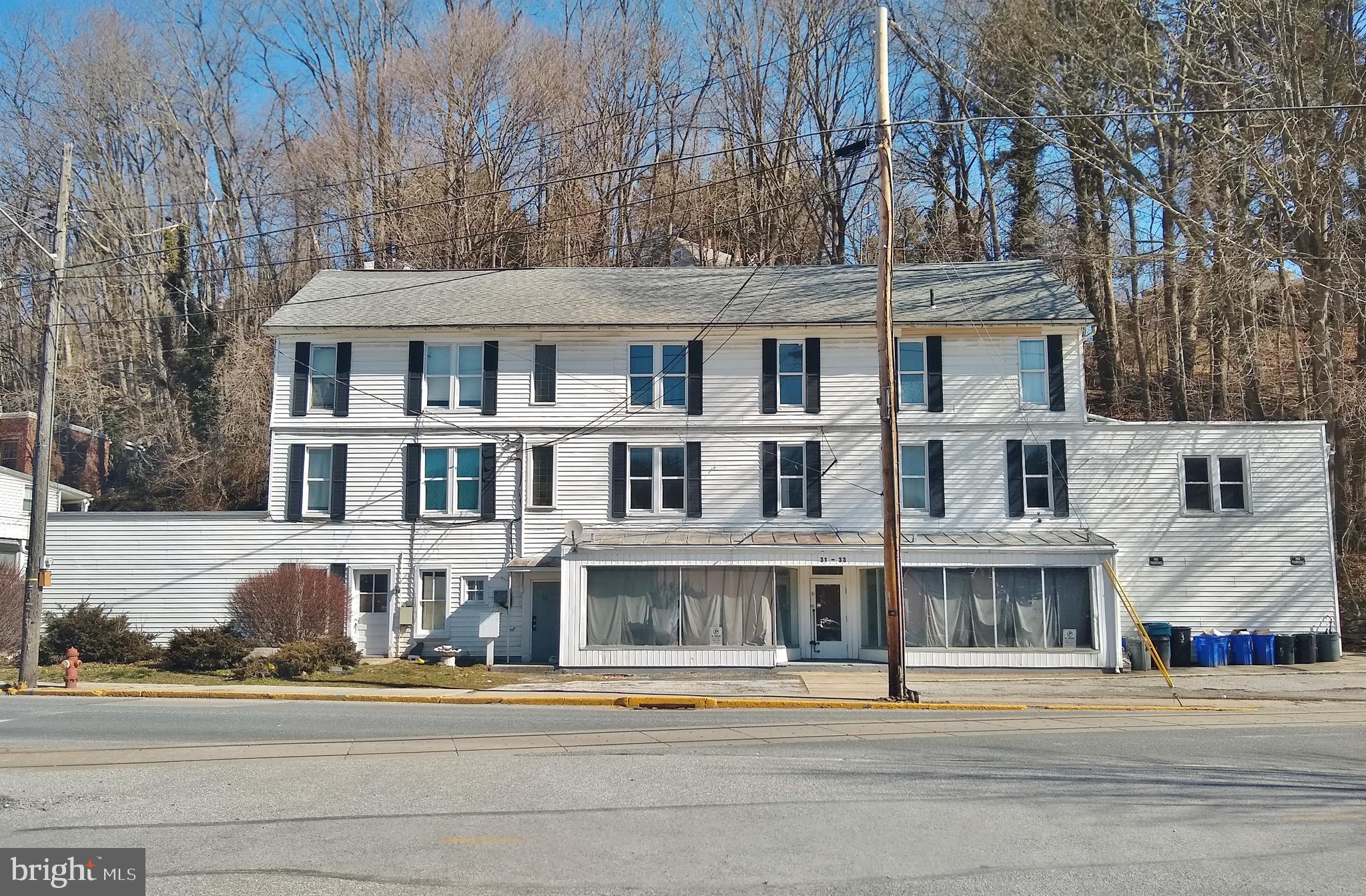Updated 8/19/2025. Welcome to this 7 Unit cash cow investment property in the heart of Glen Rock Borough.
Situated on the Heritage Rail Trail, this property really shines inside and out. This exceptionally well-kept turnkey
property is 100% professionally managed from day 1 and runs at a cap rate of 7.2% with annual rental income of almost $80,000, which includes utilities reimbursements and pet fees. A great portfolio add for investors of all levels.
PLEASE DO NOT MISS reviewing the additional documents regarding income/expenses/rents/unit
details/Improvements/utilities/meters etc. The property consists of 6 residential units and one 4,000 sq ft
commercial storage space with huge exposure display windows. All of the units are rented except the
commercial space which the owner uses currently. The commercial space can currently be used only for storage
but can be converted to suit your needs. Please contact Glen Rock Borough for more information. There is no
basement and the property is built slab on grade. Lots of parking available for tenants across from the building in
the public parking lot. No washer/dryer hookups in the units, so owner could generate more revenue by adding
laundry and tenant storage in the first-floor commercial space. All photos are from before the tenants moved in.
There is no sign at the property. Please do not disturb tenants or make unsolicited inquires with them. Seller is
consolidating businesses and hence selling. Seller prefers that any offer NOT be contingent on time needed to evaluate commercial space conversion to a prospective business use.
