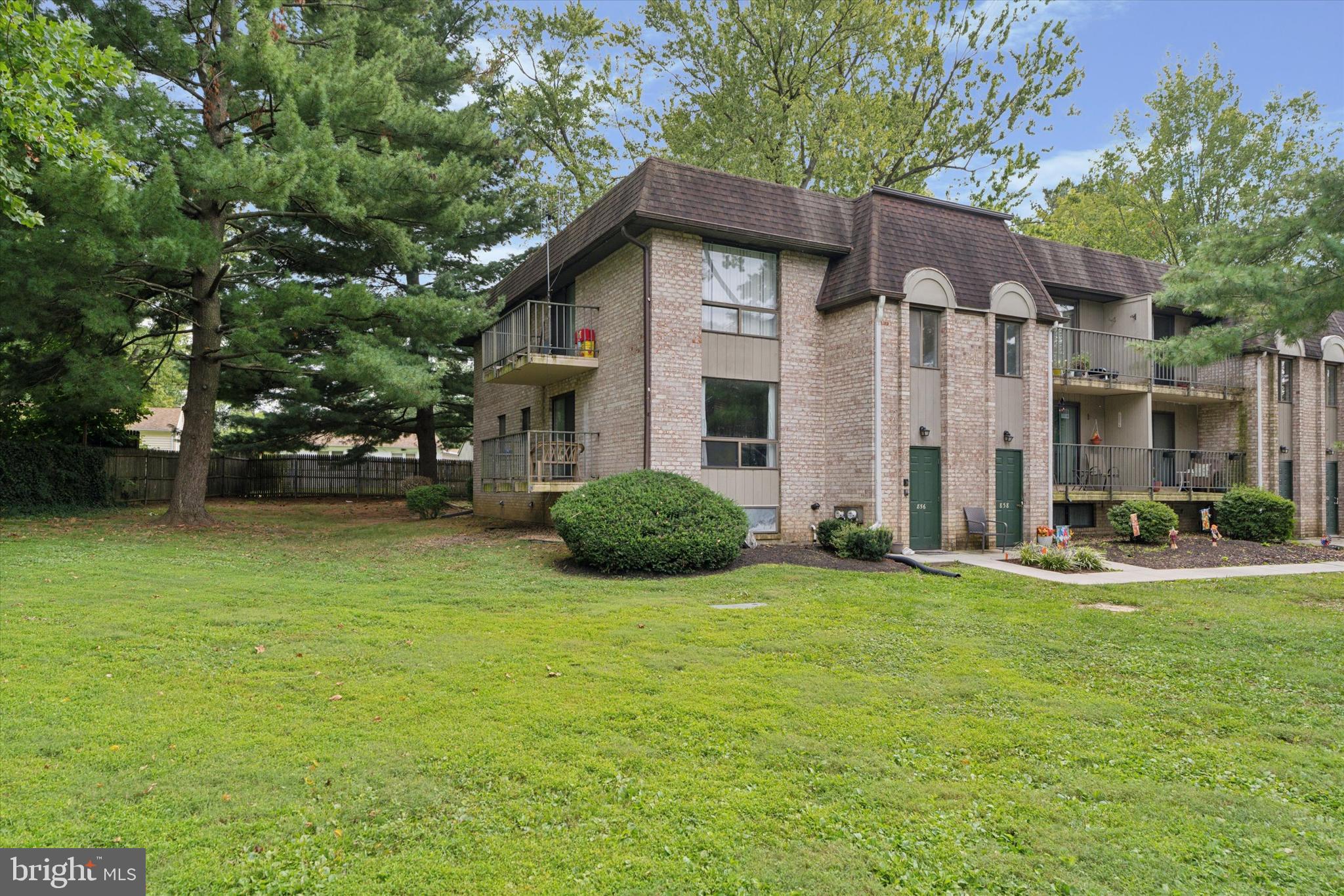 In the award-winning Wallingford-Swarthmore School District, this first-floor corner condo is situated in the sought-after Danbury Village. The home offers 2 bedrooms and 1 full bath with an open floor plan filled with natural light. The bright living room features a large window, while the dining room opens to a balcony with beautiful open field views. The dining area flows into a well-sized kitchen, making the space ideal for everyday living. The primary bedroom includes ample closet space, complemented by a generously sized second bedroom and a full hall bath. The lower level offers a large basement with abundant storage and laundry facilities. Just a short walk away, community amenities include an outdoor pool and clubhouse. One reserved parking spot is included along with plenty of visitor parking. This home is conveniently located near shopping, public transportation, the airport, and major highways I-476 and I-95, providing easy access to Philadelphia and beyond.
