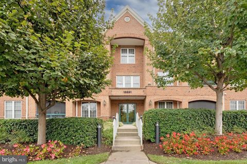 Photo of 13891 Chelmsford Drive #304, GAINESVILLE, VA 20155 (MLS # VAPW2120704)