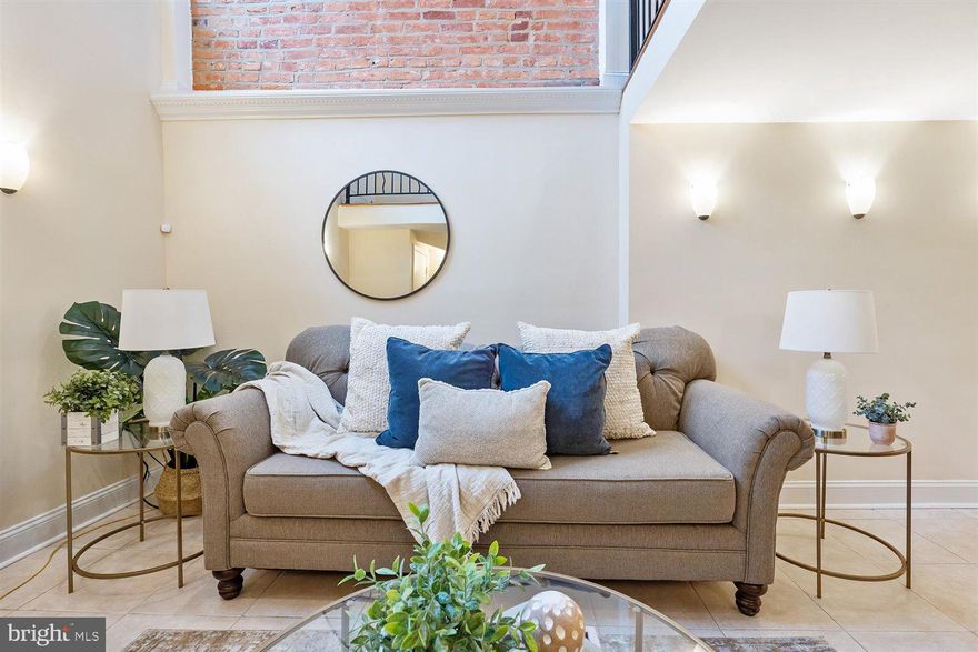 Beautiful 3 Bedroom 3.5 Bathroom Townhome In Baltimore!  Walk-In & Admire The Gorgeous  Hardwood Flooring Throughout & Exposed Brick.  Open Contemporary Layout, With A Beautiful Gourmet Kitchen Offering Stainless Steel Appliances, Kitchen Island, & Breakfast Bar. Continuing Throughout The Home To The Upper Level Which Offers A Master Bedroom With Coffered Ceilings, Recessed Lighting, & Spa-Like Bathroom With A Additional Spacious Bedroom With Exposed Brick &  Full Bathroom. Continuing To The Top Floor Is Another Spacious Bedroom With Coffered Ceilings, Natural Lighting & Bathroom With A Stand-Up Shower. The Lower Level Offers A Large Family Room With Additional Storage, And Washer & Dryer Hook-Ups. Bonus Features Includes A Large Fenced In Patio & 2 Car Parking Pad. Amazing Location Just A Few Blocks From Local Shops & Restaurants, John Hopkins & Fells Point!