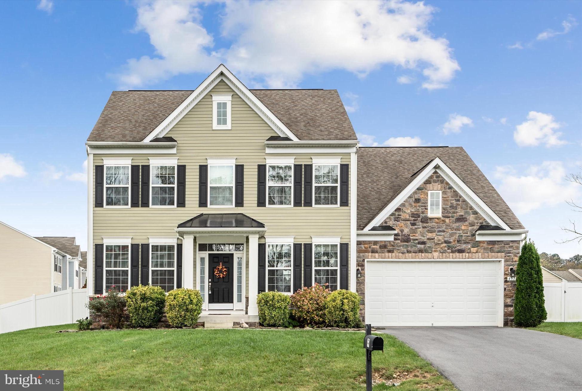 "Welcome to your dream home located at 451 Avalon Trail. This beautiful 4-bedroom, 3.5-bath property with over 3,300 finished square feet offers a perfect balance of modern convenience and timeless charm. Get ready to be wowed by the spacious layout, where the kitchen, dining, and family room flow together seamlessly, creating the ultimate entertainment space. Imagine cooking up a storm in the fully-equipped kitchen with a butlers pantry and coffee bar, complete with an island for both practical use and casual dining, are just steps away from the cozy family room. Need a quiet place to work or relax? Look no further than the private office/study, providing the perfect escape from the hustle and bustle of everyday life. For those special occasions, the elegant formal dining room is the ideal setting for intimate gatherings and dinner parties. Retreat to the expansive primary bedroom, complete with a luxurious ensuite bathroom, perfect for unwinding after a long day. And with the added convenience of a laundry area on the bedroom level, tasks become a breeze. But the perks don't end there. The fully finished basement with a full bath and kitchenette offers additional living space for guests or as a recreational area. Plus, step outside to the fully fenced backyard with a spacious patio, creating the perfect oasis for outdoor dining and relaxation. Additional features such as hardwood flooring on the main level, a 2-car garage, and extra storage building add even more convenience and comfort to this stunning home. It's time to make your move and start living in your dream home today!" All sizes are approximate.