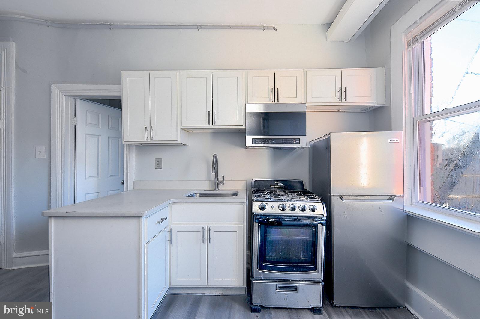Updated Photos Coming soon.
Welcome home to this newly renovated, super cozy one-bedroom, one-bathroom unit in a charming triplex nestled in the heart of historic Harlem Park. Thoughtfully updated with modern conveniences while preserving its classic character, this inviting space is perfect for anyone seeking comfort and style in a vibrant community.
Step inside to discover a spacious bedroom that provides plenty of room to unwind, a gas stove perfect for cooking up your favorite meals, and a built-in above-range microwave to maximize counter space. Stay comfortable year-round with central air, and enjoy the ease of on-site washer and dryer access—no more trips to the laundromat!
Harlem Park is rich in history and culture, featuring classic Baltimore architecture and plenty of street parking, making it easy to come and go as you please. Located minutes from downtown, public transit, and local parks, you’ll have convenient access to everything the city has to offer.
This unit won’t last long! Schedule your tour today and make this beautifully updated space your next home.