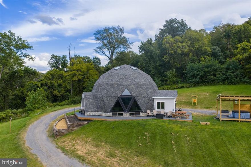 Welcome to Lunar Lookout, a stunning 3 bedroom / 3 bath geodesic dome home on 8 private acres near Shenandoah National Park, the Appalachian Trail, Skyline Caverns, and only 10 minutes from downtown Front Royal, VA. This architecturally unique and fully furnished mountain retreat features soaring dome ceilings, floor-to-ceiling windows, and breathtaking Blue Ridge Mountain views.

Enjoy the open-concept great room, electric fireplace, EV charger, and a private outdoor hot tub overlooking nature and mountains. Step outside and walk directly from the property to the Appalachian Trail. Weekly trash pickup, electric, Starlink high-speed internet, and lawn care are included in the rent.

Located near U.S. Customs and Border Protection, the Department of Veterans Services, the Smithsonian facilities, and the Northern Virginia 4-H Educational and Conference Center, this home is ideal for short-term housing for professionals, government employees, families, or outdoor enthusiasts.

Pets considered on a case-by-case basis. Property is professionally managed.  Phone number in listing is for the property manager.

Available for short-term stays only (nightly, weekly, or monthly). All utilities and maintenance included. Rates vary by season and availability.
