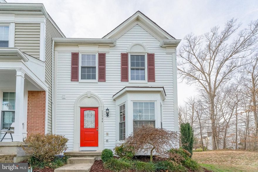 Welcome home! Beautiful and spacious 3 bed (with bonus room in lower level), 3 full and 1 half bath END UNIT located in the Ridgeleigh neighborhood in the sought after Lake Ridge community. Gleaming hard wood floors on the main and brand new carpet on the upper and lower levels.  Kitchen includes top of the art, stainless steel, Bosch dishwasher, Samsung  gas burner  stove, microwave and fridge. Separate living room and dining room flows out to the double deck/patio. Upper level has 3 inviting bedrooms with 2 full baths. While lower level  has an extra bonus room that can be used as an office space or craft room or a guest room. The basement den has plenty of space for game area or just cozy up by the fireplace. Fresh paint through out. Plenty of light. You will fall in love with this home and the community - Five pools, tons of walking/hiking trails, a marina and golf course.  Offer deadline Thursday 9PM