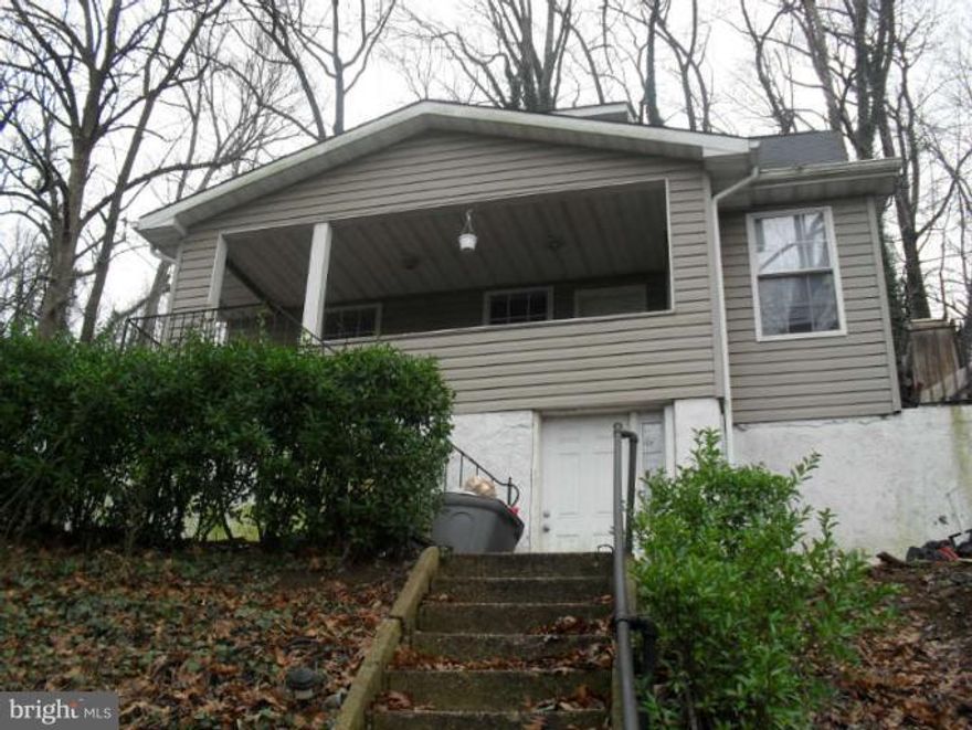 Wonderful chance to own this value price home.  Enjoy nice room sizes, wood floors, and ample rear yard.  The front porch is perfect for warm weather outdoor living space.  Use the unfinished basement as added storage or finish for more living space.  A convenient location, just a short drive to Downtown Baltimore.  Asset built prior to 1978 - Lead-Based Paint Potentially Exists