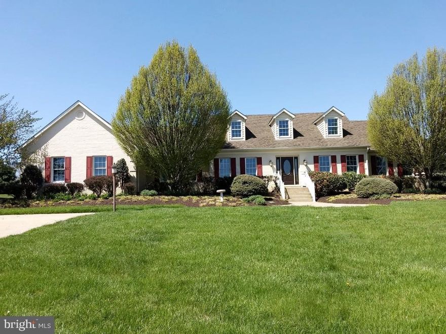 Home definitely has the WOW factor--almost 2800 square feet of living space on 3 acres of land!  All-brick cape cod features a 2-story foyer, 4 bedrooms, office, wood floors, huge country kitchen, and a large family room with fireplace.  Basement has a wet bar with dishwasher, 52 inch TV, pool table, full bath, bonus room, tons of storage and exercise equipment.  Exterior features include parking for 10+ cars, playset, storage shed, basketball hoop, and a hot tub.  Convenient to parks, shopping, 97, 32, and 70.  Really a wonderful home.