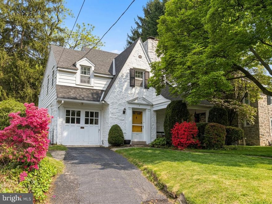 Welcome to 9 W Essex Ave, a charming 4 bedroom, 2 bath stone Colonial offering over 2,000 square feet of living space, tucked away on a quiet, tree lined street in the heart of Lansdowne Borough. Full of character and warmth, this home offers inviting living spaces, classic details, and a convenient location close to local shops, restaurants, the train, and the vibrant amenities that make Lansdowne such a special community.

From the moment you arrive, the covered front porch creates a welcoming first impression and offers the perfect spot to relax and enjoy the neighborhood. Inside, the main level features a warm, light filled living room with a classic wood fireplace, a formal dining room with a beautiful walk in bay window, and an updated kitchen that flows into a cozy breakfast room with direct access to the backyard.

Upstairs, you will find a bright primary bedroom with double closets, additional bedrooms, and a versatile fourth room that can serve as a nursery, home office, guest room, or creative space. A ceramic tile hall bath completes the second floor, while stairs from one of the bedrooms lead to a large attic offering excellent storage or future potential.

The full basement provides additional storage and flexible use, while the fenced in backyard offers space to entertain, garden, play, or enjoy everyday outdoor living. Additional features include an attached one car garage and a well maintained mechanical history, including a hot water heater installed in 2007, heater serviced in 2019, and chimney cleaned in 2019.

Located in a walkable, historic community, Lansdowne offers an active arts and culture scene, including the Lansdowne Theater, Saturday farmers market, Lansdowne Folk Club, Symphony Orchestra, and more. With easy access to Center City, the airport, and major routes, 9 W Essex Ave is a wonderful opportunity to own a home full of charm, comfort, and convenience in a truly special neighborhood.