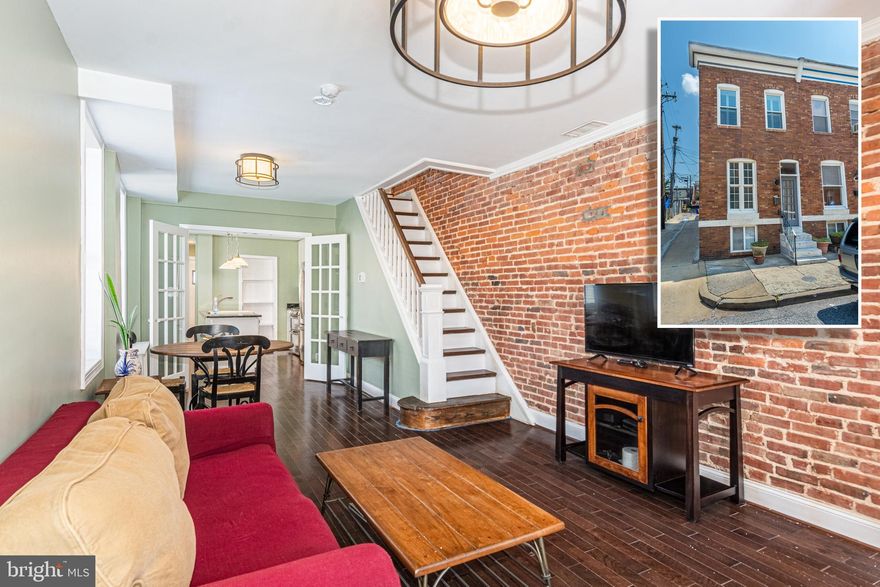 PICTURE PERFECT END OF GROUP ROWHOME WITH TONS OF CHARACTER AND CHARM!  Features include an open floor plan with hardwood floors throughout, an inviting living room with exposed brick and dining area, gourmet island kitchen with granite counters & ss appliances, main level laundry room, upper level with 2 generously sized bedrooms and a full bath with a glass enclosed shower, & a newly finished basement with a family room.  Seller will offer $2,500 credit to convert patio to a parking pad with a full price offer!  Located steps from Patterson Park!