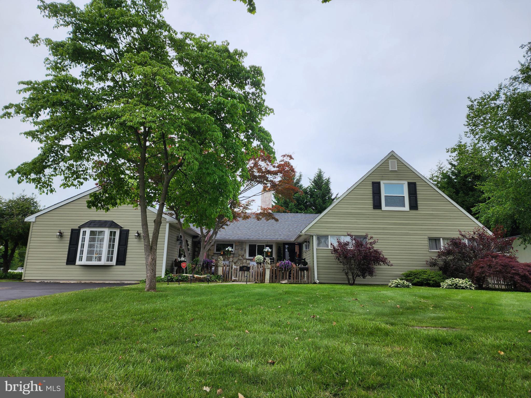 Wonderful 7 year old in-law suite on first floor. Kitchenette with cabinets, granite counters, sink, microwave and refrigerator is completely open to the family room. (18 ' x 18'). The bedroom has a full bath with walk in tub, large closet, linen closet with hot water heater, Bedroom area is large enough for an additional sitting area (25' by 11'). The in- law suite has a separate entrance, joins the main house through the kitchen, and has central heat and a/c. The main house is the typical Country Clubber set up. Full remodeled eat in kitchen with granite counters and stainless appliances, tile flooring. Spacious dining room is off the kitchen and open to the living area. There is a wood burning brick fireplace that is being sold as non functioning, only decorative. The main entrance is large with a coat closet. The main floor features three bedrooms, including a master with double closets and private bath. There is also a hall full bath. The second floor features two bedrooms, a storage area and laundry. The main house is oil baseboard heat and wall/ window a/c units. The roof and vinyl siding were replaced in 2017. 200 Amp Electrical Service NEW OIL TANK to be installed above ground prior to closing