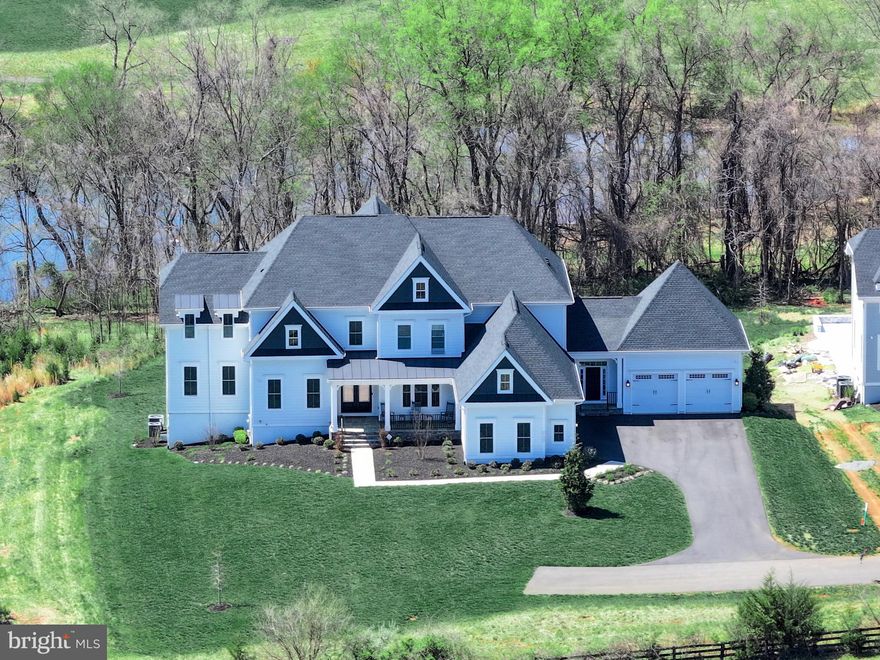 Welcome to the jaw-dropping Clifton Park II—where luxury lives, and every detail delights.If you’ve been searching for the one, this home will have your heart at hello.

From the moment you arrive, you’ll notice this isn’t just any home—this is a masterpiece. Sitting on nearly 1 acre of pristine, tree-lined land on a private street, it offers the perfect mix of elegance, comfort, and total privacy. And yes—there’s a 5-car garage for all your toys and treasures.

Inside, the wow-factor only builds. The open-concept layout invites you to live, host, and relax effortlessly. The two-story family room floods with natural light from oversized windows and offers a stunning gallery view of the upper level. It’s dramatic in the best way.

And the kitchen? It’s a chef’s dream come true—complete with double islands, Sub-Zero & Cove appliances, a custom hood, pot filler, beverage fridge, butler’s pantry, huge walk-in pantry, two sinks, and miles of luxe cabinetry and counter space. This kitchen isn’t just functional—it’s fabulous.

Upstairs, you'll find 5 bedrooms, each with its own luxury full bath, creating spa-like retreats for everyone. The main floor offers a beautiful guest suite with full bath and an extra powder room for convenience. And downstairs? A fully finished club level with bedroom #7, another full bath, a full bar, theater room, exercise space, play zone, and lounge area—all designed for serious entertaining or seriously good living.

Step outside and the magic continues. A spacious, private deck, custom patio, and sitting wall let you soak in the peaceful views and fresh air—your outdoor sanctuary awaits.

This isn’t just a house. It’s where luxury meets lifestyle.Every inch has been designed to elevate your every day.Welcome to your dream home. Welcome to Clifton Park II.