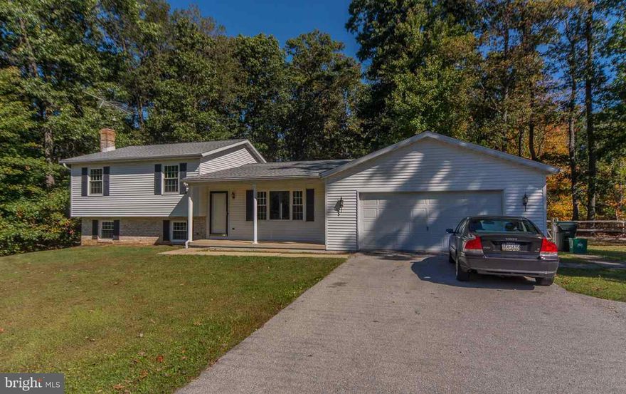 Fantastic 3 level home and ready to move in, new stainless steel appliances, new hot water heater, newer roof, newer replacement windows and doors, hardwood flooring, huge fenced yard, oversized 2 car garage.