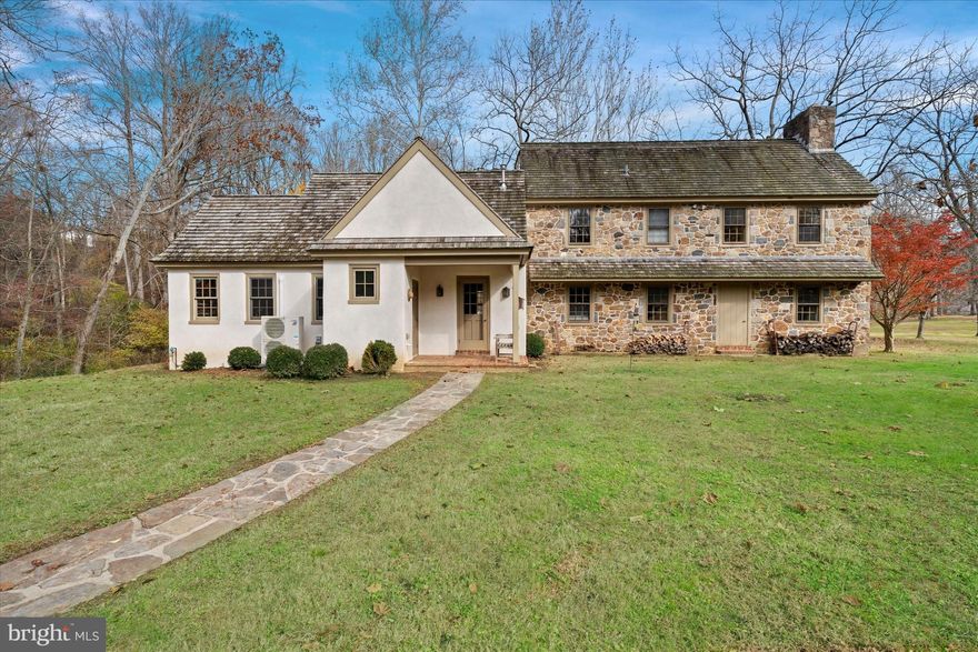 Follow the long tree lined drive to this wonderful property.  975 Brintons Bridge Rd is rare find on this coveted road.  Coming up to the property you will appreciate the lay of the land and the privacy that this property affords.  Enter the home that is filled with charm and details such as brick flooring, random width hardwoods, deep window sills and exposed beams.  The formal Living Room has a fireplace with doors on either side that lead to the back yard.  From there you flow into the formal Dining Room with brick flooring and exposed beams.  On to the kitchen that is an eat in and overlooks the Family Room with fireplace and built ins.  On the other side of the kitchen down a hall is a Mud/Laundry Room with outside access and tons of closet space.  Continuing down the hall, you will find a large Library/Study/Office space that overlooks a stone patio, private backyard and large pond.  A half bath completes the main floor.  There are two staircases to the second floor, a primary bedroom with fireplace and full bath with attached dressing room with multiple closets that has direct access to the second of the three bathrooms, two more bedrooms, one with a fireplace and the third full bath.  Outside, a rear patio and a composite deck that overlooks a large aeriated pond.  .  There are a number of buildings on the property including a 3 car detached garage with its own attached cottage.  The cottage is the perfect space for a studio, quiet space, man-cave or guest quarters.  It has a full bath, a bedroom and large living room.  Down the driveway, on the other side of the pond, there is a storage barn with 4 concrete bays, electric, water, connected office/storage/filing room.  For the pets in the family there are kennels,  a 3 stall barn with covered protection on either side, 2 pastures and a smaller fenced paddock.  This property is convenient to Chadds Ford, West Chester, Wilmington, fabulous restaurants and amenities.