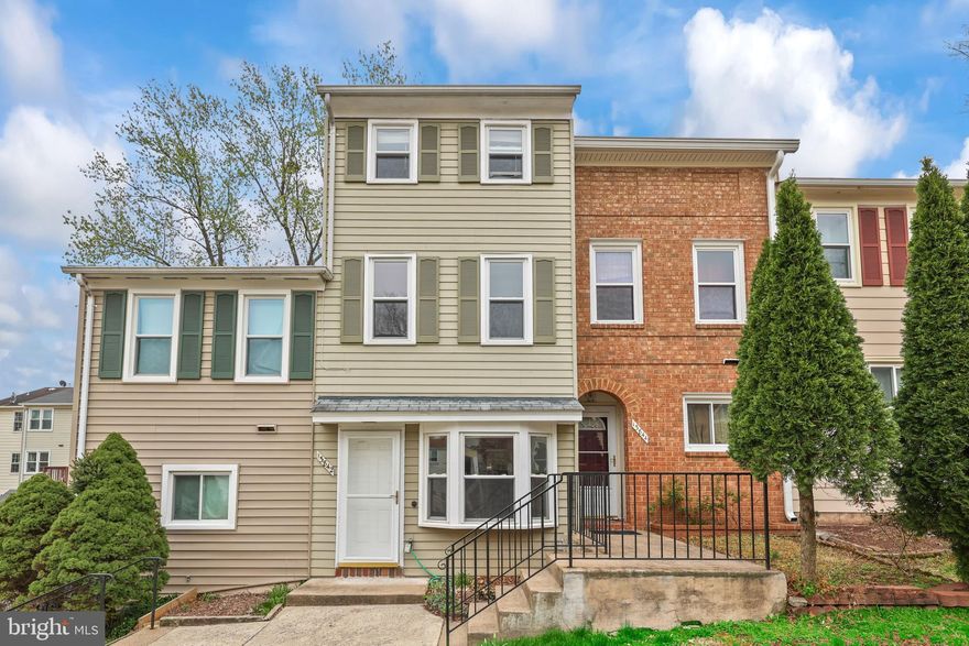 OFFERS RECEIVED - DEADLINE NOON MONDAY 4/7
Move-in Ready 3-Level Townhome Near a Peaceful Park Trail!  Freshly painted throughout, this lovely 3BR/2BA TH features stylish wood-look laminate flooring on all three levels, even the stairs!  The main level offers a spacious living and dining area with a charming bump-out window and built-in window seat perfect for basking in the afternoon sun.  Updated in 2024, the kitchen sparkles with new granite countertops, crisp white cabinetry, and a new refrigerator. The microwave has been replaced.  A sliding glass door welcomes an abundance of natural light, leading to a private patio enclosed by a new fence.  On the middle level, two generously sized BRs share a full BA.  Either room would make a great home office, if needed!  The top level is dedicated to the luxurious primary suite, complete with a walk-in closet, private BA, and a large storage room.  An in-unit washer and dryer on this level is so convenient!  Well maintained, there are newer double-pane windows throughout. and the heat pump & roof have been replaced.  All the attic insulation was upgraded in 2023 to add energy efficiency.  Two reserved parking spaces (#122) convey!  The scenic Flatlick Branch forested trail system links the neighborhood to playgrounds and parks!  Just minutes to Dulles Airport, Rte. 28 and I-66.  Greenbriar shopping center is minutes away with every possible store and restaurant you could need!  Here's your chance to own an affordable, move-in-ready home!