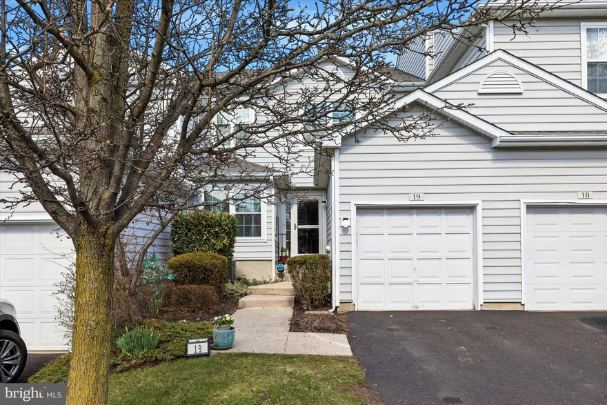 Welcome to 14 Victoria Circle, a beautifully maintained townhome located in the highly sought-after Thornhill community in the heart of Collegeville. Perfectly positioned in one of Montgomery County’s most desirable areas, this home offers a wonderful blend of comfort, style, and convenience just minutes from popular destinations such as the charming shops and restaurants of Skippack Village, with easy access to Route 422, King of Prussia, and Philadelphia. Step inside to an airy first floor featuring wood flooring and a partial open floorplan anchored by a classic wood-burning fireplace, creating an inviting space for both relaxing and entertaining. A double set of sliding doors leads to the rear cement patio and garden area, offering a wonderful outdoor setting for enjoying fresh air, gardening, or gathering. The main level also features a convenient half bath, kitchen with stainless steel appliances, and breakfast nook. Upstairs, freshly cleaned plush carpeting extends throughout the stairwell and second floor, where the spacious primary suite features a walk-in closet and garden-style ensuite bath. Two additional bedrooms, a full hallway bathroom, ample closet space, complete the upper level. The home also offers an abundance of natural sunlight, one-car attached garage equipped with a hoist, providing additional functionality and storage. Numerous updates provide added value and peace of mind, including a new roof and siding installed in 2025, a new furnace and water heater with leak detection installed in 2023, windows replaced in 2018, a new screen door installed in 2024, and the fireplace and chimney inspected in 2026. Residents of Thornhill enjoy a low-maintenance lifestyle with an HOA that covers common area maintenance, exterior building maintenance, lawn care, snow removal, trash service, and access to the community health club and pool. This is an exceptional opportunity to own in one of Collegeville’s most desirable communities.