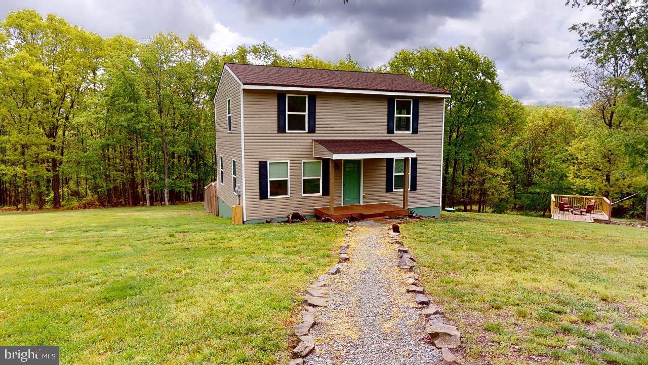 Full Time, Part Time, Any Time Living in the Beautiful Home only Minutes from The Historic Town of Romney. This 2 Bedroom, 2 Bath, 2 Level living has many possibilities. Add a wall in the upper level and add additional bedroom count. The little cabin secluded in the woods could be the perfect playhouse, escape or indoor camping space. Just a few miles from this country setting home is the South Branch of the Potomac River for your water fun. Go the other direction and you will find over 8000 acres of Nathaniel Mountain Public Land. (check out the virtual tour)