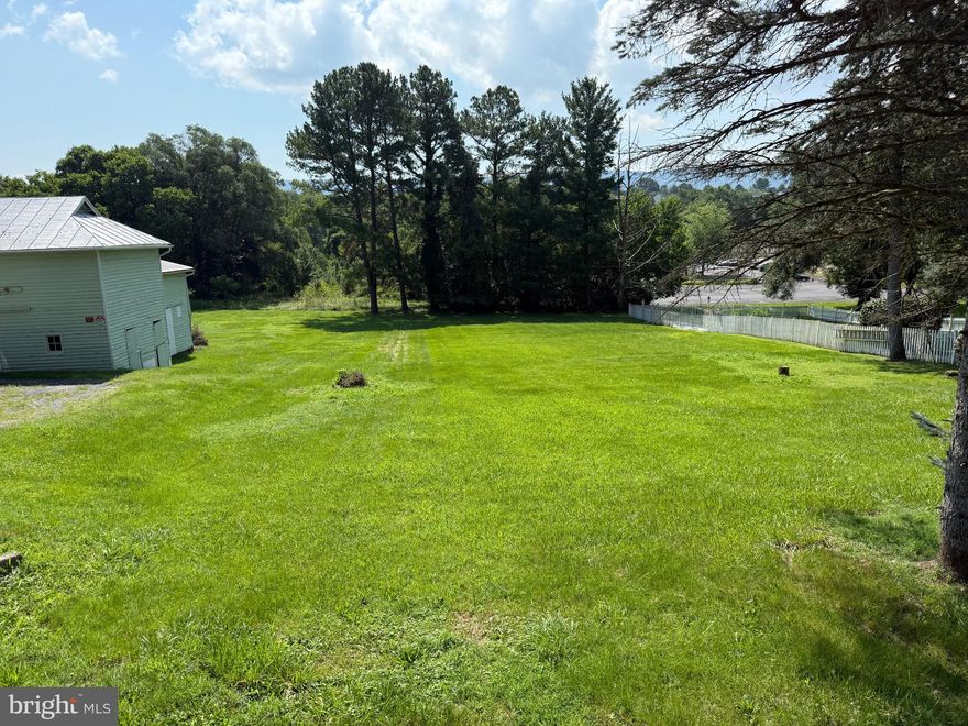 Business Zoned tract of land located in the Town of Woodstock containing approximately .430 ac. +/-  situated across the street from Massanutten Academy.  Seller has two lots for sale: Lots 1 and 3,  suitable for professional office or retail.  Build on one and use the second lot for parking.  Purchase both together for $145,000 or sold separately for $70,000 for Lot 1, and $85,000 for Lot 3.