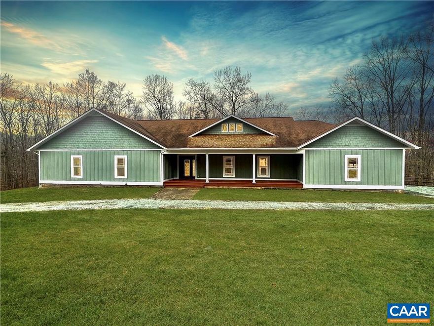 You're going to LOVE this 3,454 square foot, spacious & renovated, Craftsman-style rancher with 6 car garage situated privately on OVER 22 ACRES! As you pass through the deep covered front country porch you're greeted with new luxury vinyl plank flooring throughout, fresh paint throughout the entire home, vaulted ceilings, and tons of natural light with a HUGE open floor plan. To the left of the entry you will find beautiful Tiffany-style light fixtures in the hall, a laundry closet with stained glass entry, a full hall bath, 2 oversized bedrooms with double closets and new carpet. The MASSIVE primary bedroom has new carpet, 3 walk-in closets, back deck access, an en-suite bath with tile floors, quartz double vanity, separate tile shower & pedestal tub with wainscoting finishes along the bathroom wall. In the living room there are 4 sliding doors that access the large freshly painted back deck with vinyl railings. The kitchen boasts tons of cabinet space, a pantry, granite countertops, a countertop smooth top range, & an eat-in dining area with a bay window. There is an attached side-load 3 car garage as well as an enormous detached 3 bay garage. Fenced area on property for animals!