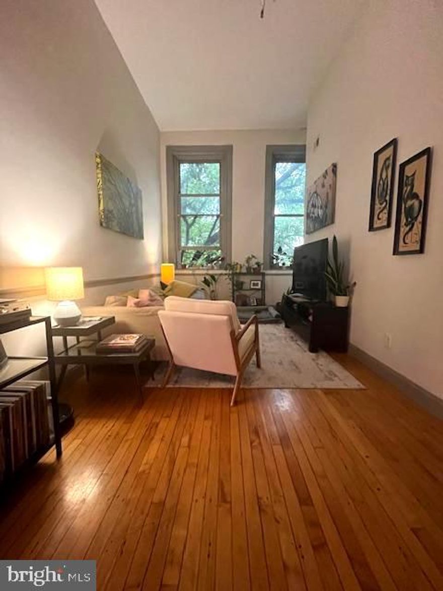 Live in the Heart of Fells Point in a Historic Schoolhouse Conversion
Just blocks from the vibrant waterfront, Fells Point, and the Inner Harbor, this top-floor 1-bedroom, 1-bath condo offers unbeatable walkability to beloved restaurants like Ekiben, cozy cafés, and local shops. Enjoy the best of Baltimore living in a charming, light-filled home with modern comforts and rich historic character.

Set in a beautifully restored Victorian building—formerly Public School 25 and converted in 2006—this unit features original wide-plank pine floors, soaring ceilings, and oversized windows that bathe the space in natural light. The open living area includes recessed lighting, a ceiling fan, central A/C (roof unit), and electric heat. The well-appointed kitchen is complete with an electric range, dishwasher, microwave, and washer/dryer for convenience. Shared patios on either side of the building offer perfect spots for morning coffee or evening relaxation.

Don’t miss your chance to own a unique piece of Baltimore history in one of the city’s most exciting neighborhoods.