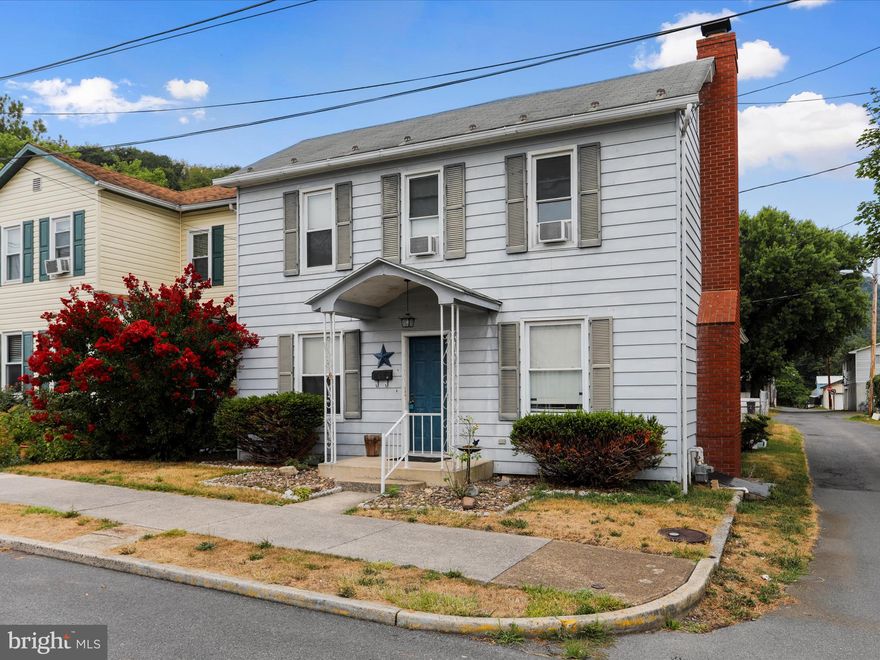 Welcome home!  Nestled in the heart of Keyser this 3 bed 1 1/2 bath home is just waiting for you to call it home!  The rear yard is fully fenced and leads to your 1 car detached garage with additional carport attached.  The lower living level is accented with a large living with cozy fireplace and a wonderful tile-floored sun/Florida room!  You don't want to miss this one!