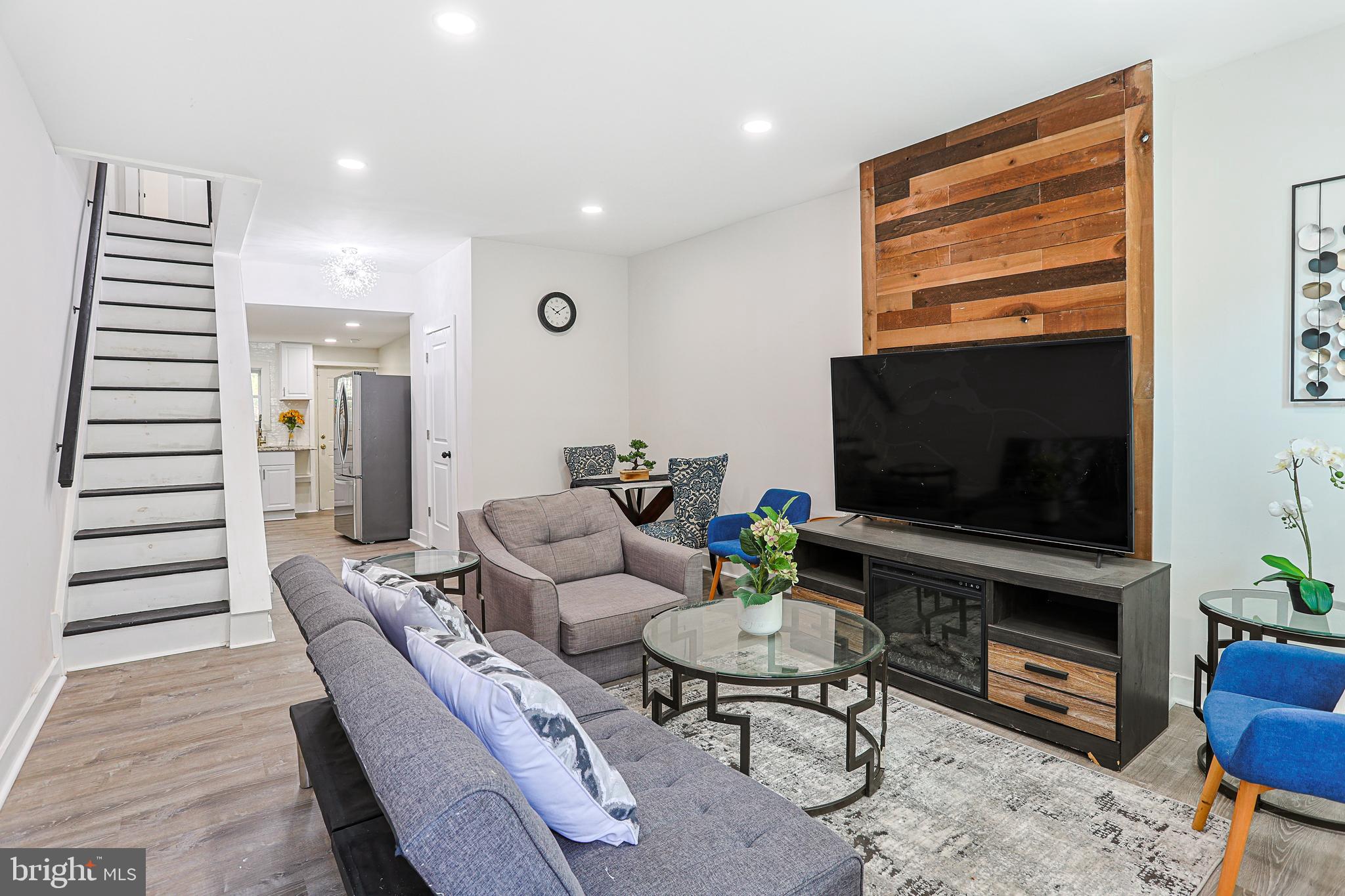 BACK ON MARKET- Previous buyer's financing fell through-
Step into this stylish, renovated townhome, where modern updates meet classic charm. Located in a vibrant Philadelphia neighborhood, this home offers a spacious and inviting layout with thoughtful finishes throughout. You can move right into this home as all appliances, furniture, and furnishings are included in the home! As you enter, you're greeted by an open-concept living area, where engineered vinyl plank floors flow seamlessly from the living room to the dining room. This bright and airy space is perfect for both entertaining and relaxing. The dining room leads into the updated kitchen, featuring sleek appliances, built-in microwave, and ample cabinetry for all your culinary needs. A convenient half bath rounds out the main floor, adding to the home’s functionality. Upstairs, you’ll find three well-sized bedrooms, each with plenty of natural light. The full bathroom on this level boasts a tub/shower combo, offering both comfort and convenience for everyday living. The lower level of this home is a true bonus, with a partially finished basement that provides extra living space – ideal for a family room, media room, or home office. The basement also includes a laundry area for added convenience. Situated in Philadelphia, this home offers easy access to local highways, making your daily commute a breeze. Whether you're heading into the city or out to the suburbs, you’ll love the convenience of being close to it all. Don’t miss out on the opportunity to make this beautifully renovated townhouse your new home. Schedule a tour today and envision your life in this move-in ready gem!