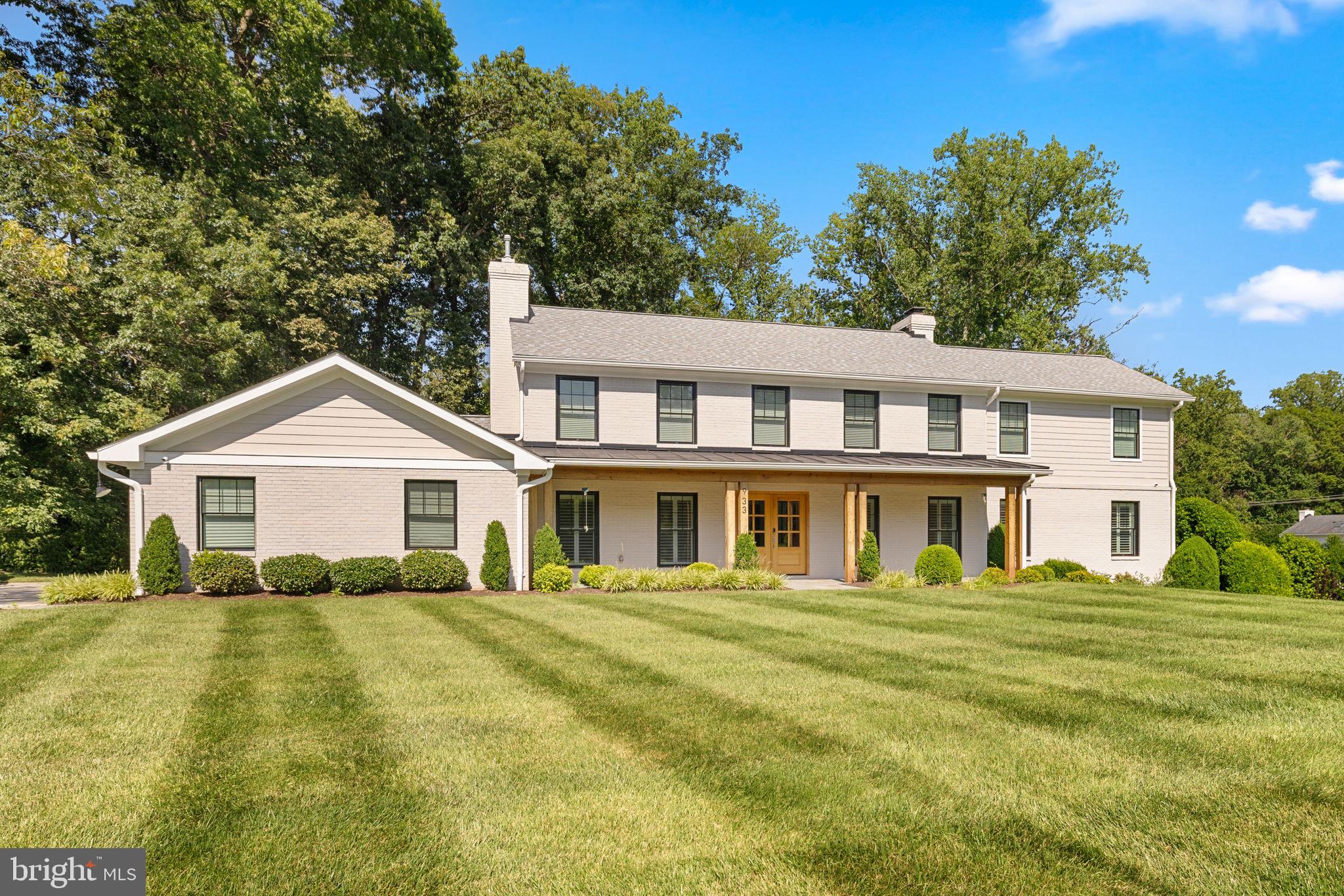 Stunning Custom Home in Olde Swinks Mill Estates with Pool and Luxury Finishes. Completely redesigned and renovated inside and out in 2020, this elegant residence blends modern luxury with timeless sophistication. With approximately 6,500 square feet of refined living space this home has a seamless flow for everyday living and exceptional entertaining—indoors and out. Ideally situated on a beautifully landscaped lot in the prestigious Olde Swinks Mill Estates, this home also offers a beautiful private outdoor oasis with a pool, spa and steam shower. The light-filled main level begins with a gracious foyer flanked by a formal living room and a custom-designed library with exquisite built-ins. At the heart of the home is the show-stopping chef’s kitchen, featuring a large center island, quartz countertops, whit w shaker cabinetry with smart-close drawers and doors, a six-burner cooktop, Thermador WiFi-enabled stainless steel appliances, and a well-appointed breakfast area. The open-concept floor plan continues with a spacious family room and formal dining area, while a mudroom, powder room, and large deck overlooking the pool complete the main level. Upstairs, the expansive owner’s suite is a serene retreat with a private balcony overlooking the pool, two large walk-in closets, and a luxurious en suite bath. The upper level also offers three additional en suite bedrooms and a convenient laundry room with custom cabinetry. The fully finished, walkout lower level is designed for fun and functionality with a spacious game room, rec room with fireplace, full wet bar, a fifth bedroom, two full baths, an additional half bath, and a fully equipped exercise room with a second wet bar. The lower level opens directly to a resort-style backyard oasis featuring a stunning pool, expansive patio, and direct access to a pool lounge with a steam shower and Additional highlights include solid wood doors throughout the main and upper levels, smart home wiring, and thoughtfully designed kitchen cabinetry with pull-out trays, spice and trash drawers, and a built-in charging station. Located in one of McLean’s most desirable neighborhoods, this home offers easy access to top-ranked schools, the Silver Line Metro, and Tysons Corner. Nature enthusiasts will love nearby Scotts Run Nature Preserve with its scenic hiking trails to the Potomac River. Just minutes from Spring Hill Recreation Center, sports fields, playgrounds, and the Hamlet Swim & Tennis Club, as well as premier arts venues like Capital One Hall and Wolf Trap National Park for the Performing Arts, this exceptional home offers the perfect blend of comfort, style, and convenience.