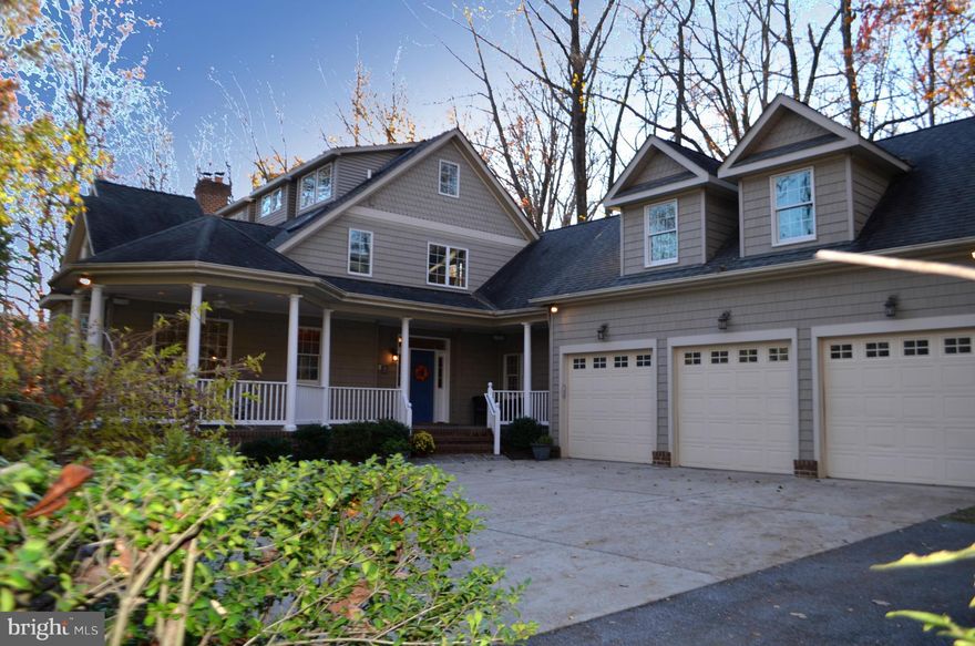 This extraordinary waterview home has everything! Bright,open & comfy living spaces.Walls of windows highlight its natural, private setting. Gourmet Kitchen w granite, Viking appliances & views from every window! Offers 7 BRS includ 1st floor luxury master  w/ gas FP & French doors out to multi-level deck. Private in-law suite. Lower level has FR w/ fireplace, game & play rooms. INCLUDES MOORING!