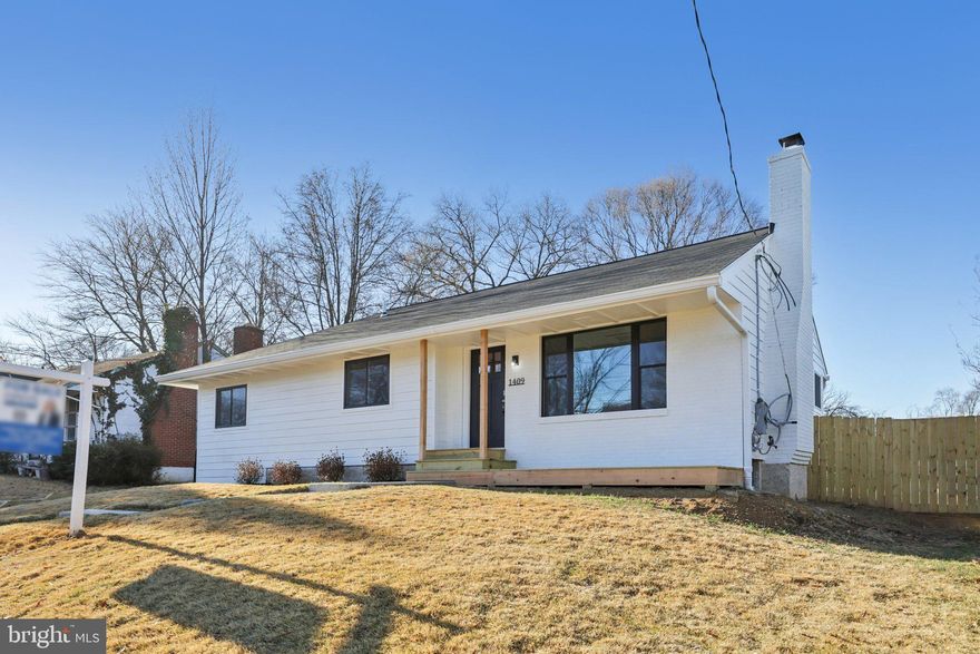 Welcome to 1409 Fenwood Avenue — a fully rebuilt 5-bedroom, 3 full-bath home offering turnkey living with every major system thoughtfully replaced, including electrical, plumbing, HVAC, roof, and insulation. Fully permitted, inspected, and issued an occupancy permit, this home delivers the rare combination of modern finishes and long-term peace of mind.

Inside, the main level opens to bright, refreshed living spaces designed for comfortable everyday living. The living room is anchored by a fireplace and offers generous space for gathering, while the adjacent kitchen provides efficient workspace and flows naturally into a dedicated breakfast nook for casual meals and morning coffee. Updated finishes throughout create a clean, cohesive feel that carries from room to room.

Four bedrooms are located on the main level, including the primary suite positioned for privacy with its own en-suite bath and walk-in closet. Three additional bedrooms provide flexible space for family members, guests, or home office needs and are served by a full hall bath.

The finished lower level expands the home’s livable space with a large recreation area offering plenty of room for a media space, game room, fitness area, or additional living zone. A fifth bedroom and full bath on this level provide comfortable accommodations for guests or extended stays, while the laundry room and utility area add everyday practicality and additional storage.

Outside, the fenced backyard provides a private setting with space to relax, entertain, or create your own outdoor retreat.

Conveniently located in Oxon Hill, the home offers excellent access to major commuter routes including I-495, I-295, and the Woodrow Wilson Bridge, providing direct connections into Washington, D.C., Northern Virginia, and surrounding employment centers. National Harbor, MGM National Harbor, Tanger Outlets, and a wide variety of shopping, dining, and entertainment options are just minutes away, while nearby Metro stations provide additional commuting flexibility.

With its complete rebuild, modern updates, and flexible living space across two finished levels, 1409 Fenwood Avenue presents a rare opportunity to own a truly move-in ready home designed for today’s lifestyle.
