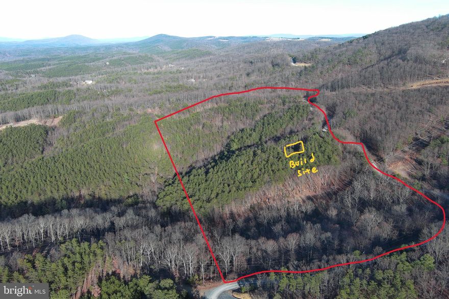 MOUNTAINEER STARTER KIT......20 ACRES READY FOR A GOOD TIME, COMES WITH ALL THE TOYS YOU NEED TO GET STARTED IN WV....4 WHEELER, CANOE, UTILITY TRAILER, HANDTOOLS & YOUR OWN DELUXE SHED.....CLEAN UP IN THE OUTDOOR SHOWER....YEE YEE! ALL THAT STUFF IS JUST FOR STARTERS....THIS LOT IS WORTHY OF A TROPHY HOME OR CABIN, DRIVEWAY INSTALLED TO NICE CLEARED BUILD SITE WITH TOP NOTCH MOUNTAIN VIEWS, FIND A FRIEND AND A CHAINSAW TO OPEN UP THE VIEW EVEN MORE. PERC TEST APPROVED AND POWER WITHIN 200 FT OF BUILDING SITE. FEELS LIKE YOU'RE WAY OUT BUT IT'S JUST OUTSIDE OF TOWN, HAVE A PIZZA DELIVERED DURING TARGET PRACTICE......TAKE THE CANOE ON A SHORT 3 MILE DRIVE TO THE NORTH OR SOUTH FOR PUBLIC ACCESS ON THE SOUTH BRANCH OF THE POTOMAC RIVER. HUNT, CAMP, SHOOT, ATV'S OR BUILD. WHETHER YOU'RE LOOKING FOR A WEEKEND RECREATIONAL RETREAT OR A SPOT TO CALL YOUR FOREVER HOME....THIS ONE CHECKS ALL THE BOXES! NO TITLES FOR ATV OR UTILITY TRAILER, ITEMS CONVEY "AS IS"