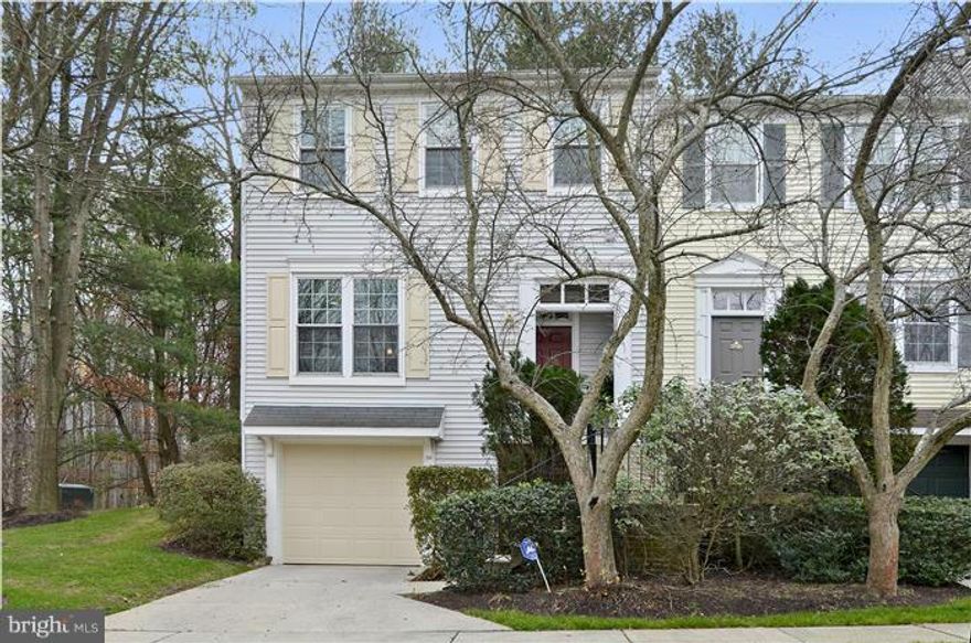 Upgrades galore!Replacements inc: energy efficient triple pane windows, beautifully renovated baths, front loading washer/dryer, air conditioner/heat pump, dishwasher, garage door, Silestone counter tops & all new plumbing!! This large, end unit townhome features a eat-in kitchen that walks out to a private deck backing to woods.Too many amenities to list!Perfection!