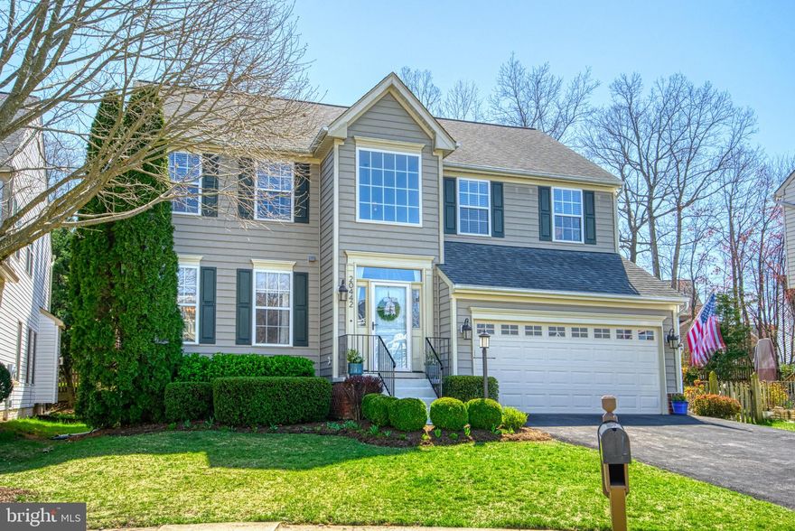 THIS IS IT! LOOK NO FURTHER! A completely updated home owned by an interior designer with about $130k worth of upgrades, custom designer touches, and improvements- all within the heart of Ashburn. You first notice the attention to detail upon driving up to the home, with grown in professional landscaping and designer lighting highlighting the custom-painted front door. Upon walking in, your eye is drawn up in the foyer to the cathedral ceiling with vintage lighting- but don't miss the engineered hardwoods throughout the main level! To the immediate left, a multi-purpose room can be used as a homework room or office (current usage) - or can be converted back to a living room- OR can be envisioned to fit your needs. This leads into the dining room overlooking the gorgeous backyard with tons of natural light. The eat-in kitchen has undergone multiple renovations over the years, with custom cabinets that feature pull-out shelves, lighting, and glass fronts; new (2023) backsplash; and gourmet stainless steel appliances. At the center of the cozy family room is a floor to ceiling custom gas fireplace expertly made by a local woodworker with marble tile surround in a herringbone pattern. You also have a redecorated half bath with newer designer wallpaper, vanity, mirror, and lighting. Heading upstairs, make sure to notice the lovely runner leading you to the expansive landing with engineered hardwood. All bedrooms feature new (2023) carpet and upgraded padding. The primary suite with vaulted ceilings feels grand, especially as you enter the spa-like attached bath with marble tile HEATED flooring, dual marble vanity, soaking tub, and walk-in shower featuring river rock flooring and marble tile surround. The walk-in closet is well-organized with an ELFA closet system. The additional upstairs bedrooms all have unique and charming details including a shiplap wall, custom ceiling pattern, and ELFA closets. Servicing all additional bedrooms is a renovated hall bath with dual sinks, soapstone tile flooring, updated lighting, and transom window allowing light to filter in yet providing privacy. The basement (currently being used as an in-law suite) is nearly fully finished with multiple closets with ELFA systems, a built-in bar with beverage refrigerator, projection/surround sound capabilities, and a full bath. And just as you may have noticed- the whole house has been repainted in 2024! You may access the rear yard via French doors to stairs walk-up from the basement or a French door from the family room. Fully landscaped a few years ago, the fully-fenced backyard features a stamped concrete patio, butterfly/pollinator garden, a rock garden with retaining wall that are home to ferns, dogwood trees, and so much more. Don't miss out on the peony garden on the side yard! Every spring, it blooms and the scents are glorious. As part of Ashburn Farm, one of Ashburn's first communities, homeowners have access to multiple pools (one within walking distance), tennis courts, baseball fields, and more. Location is everything for this home as it's steps from the WO&D Trail as well as the Ashburn Library. It's closely accessible via all local commuter routes including Route 7, Route 28, and the Dulles Greenway. Whole Foods, Trader Joe's, and more are all within a quick drive. Don't wait in making this your home today!