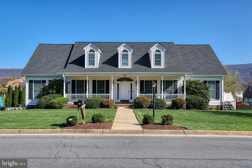 Welcome to this charming spacious and well-maintained 5 bedroom, 3 bathroom home, offering 3,374 sq ft. of finished living space above ground.  Situated on a beautiful corner lot in a desirable neighborhood.
Step inside to find a functional layout featuring hardwood floors in hallway, dining room and living room which leads into the kitchen through pocket doors.  From the side entrances you enter into a large mud room leading into the kitchen with ample space for entertaining.  The large deck on the back is entered through two patio doors off of the living room and is perfect for gatherings, while the covered front porch offers a cozy spot to relax.
This home boast several recent upgrades including a new roof with a 40 year warranty, a new water heater, a new water treatment system and new garage doors.  A whole house humidifier ensures year-round comfort.  The paved driveway leads to a spacious two car garage, with an additional workshop in the basement for hobbyists or extra storage. Gas logs do not work and convey as is
Don't miss this opportunity to own a beautiful home in the Shenandoah Valley.