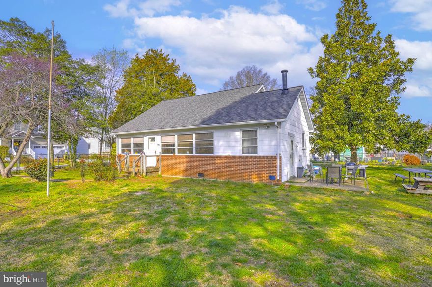 Set on one of the largest parcels in the highly desirable Selby On The Bay community, this property sits on a rare double lot—offering potential space for a garage, outbuilding, or future expansion. The home features a kitchen that opens to the living room, a bright enclosed porch for year-round enjoyment, two main-level bedrooms (one without a closet), and a full bath. Upstairs, you’ll find two additional bedrooms and another full bathroom, providing flexible living space. The fully fenced yard includes a spacious shed or “man cave” with electricity—perfect for hobbies or extra storage. Major updates include a roof approximately 3 years old, along with an oil furnace and hot water heater that are about 4 years old. Enjoy the convenience of walking to community amenities such as the beach, clubhouse, boat ramp, playground, and more.