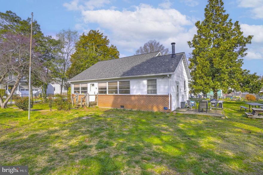Set on one of the largest parcels in the highly desirable Selby On The Bay community, this property sits on a rare double lot—offering potential space for a garage, outbuilding, or future expansion. The home features a kitchen that opens to the living room, a bright enclosed porch for year-round enjoyment, two main-level bedrooms (one without a closet), and a full bath. Upstairs, you’ll find two additional bedrooms and another full bathroom, providing flexible living space. The fully fenced yard includes a spacious shed or “man cave” with electricity—perfect for hobbies or extra storage. Major updates include a roof approximately 3 years old, along with an oil furnace and hot water heater that are about 4 years old. Enjoy the convenience of walking to community amenities such as the beach, clubhouse, boat ramp, playground, and more.