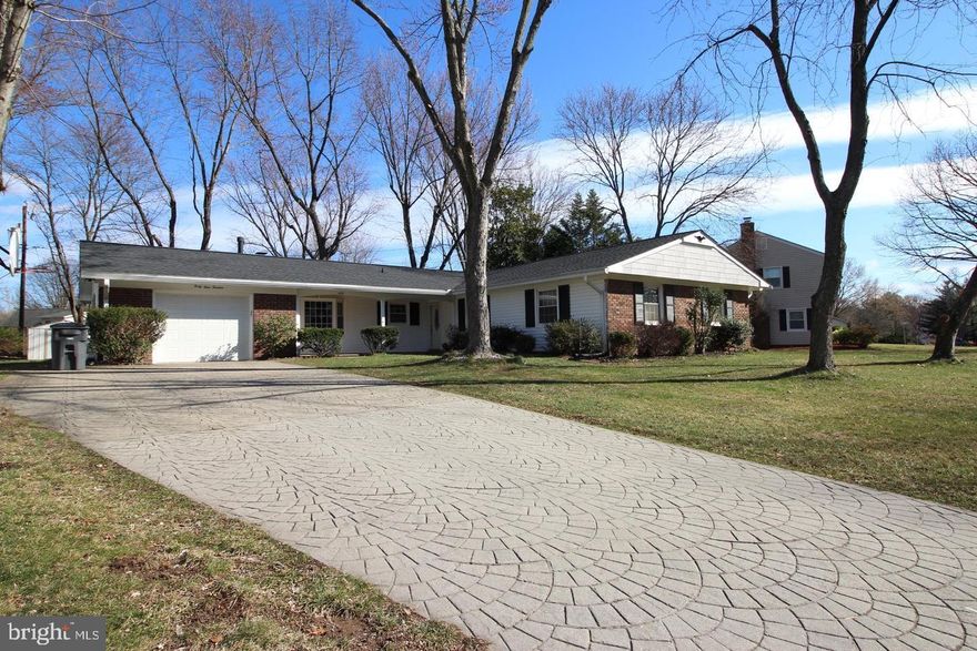 Fantastic Contemporary 4 bedroom/2 bath one level home in sought after Greenbriar community!  This home sits on a large level lot with stamped concrete driveway, covered porch, and large private rear yard with patio and shed.  Room for garden!  Step inside to a fully renovated modern kitchen with mosaic tile backsplash, granite countertops, and high end appliances.  Eat-in kitchen.  Lovely large living room with bay window.  Laundry/utility room with newer washer/dryer.  Freshly painted.  A MUST SEE!