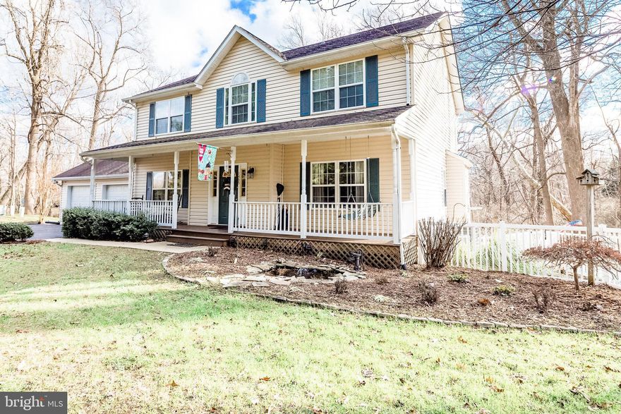 Enjoy this warm and inviting colonial home that has been meticulously maintained nestled in a private setting!   Open free flowing interior that has been freshly painted with  loads of natural light and high ceilings.  Smartly designed kitchen leading to cozy living room with  warming pellet stove.  Stylish formal dining room.   Large master suite with great closet space and tastefully  renovated deluxe master bathroom.   Soaking tub and designer custom tiled shower. Finished lower level  to lovingly accommodate friends or family complete with kitchen bar area. Entertainers delight and outside oasis- Sparkling fiberglass in-ground  pool, and spacious deck overlooking wooded backdrop.  Or relax on the covered front porch  overlooking a peaceful Koi pond  Energy efficient with pellets stove in the basement also!