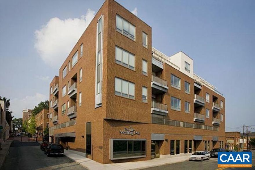 Downtown Location! This large, light-filled luxury condo is located right off the historic mall in the Holsinger building. Enjoy all the downtown area offers; amazing restaurants and bars, boutique shopping, Fridays After Five, and concerts! Minutes away from UVa as well as the 250 bypass. Features include high ceilings, hardwood floors throughout main living area, carpeting in the bedrooms and ceramic tile in the bathrooms, granite counters, stainless steel appliances & cherry cabinets in the Kitchen, a stackable washer/dryer, 2 large bathrooms (one with a walk-in glass shower), oversized windows in the Main Bedroom with ample closet space plus an additional bedroom. A balcony overlooking 5th Street/views of the downtown mall is located right off of the large Living Area. Secured garage parking with one space allocated to tenant. Trash and condo fees included. Available January 2026. 6-month minimum. NO SMOKERS OR PETS. Security deposit of $2,800 + first month's rent of $2,800. Credit check and application required.  6-month minimum term required by HOA. A longer term can be discussed. Direct all inquiries directly to owner.  Serious inquiries only.