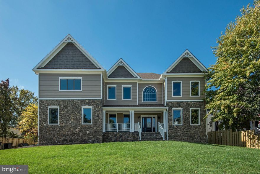 OPEN SAT 1-3. NEW LIST PRICE! New Luxury Home! This stunning 6 bdrm, 5.5 bath custom home is situated on a huge lot in the heart of one of Arlington's most highly desired neighborhoods. You will enter this stately home through the grand 2-story foyer, accented by an exquisite chandelier and winding natural wood staircase.  The open floor plan allows you to appreciate the rich detailing throughout the home.