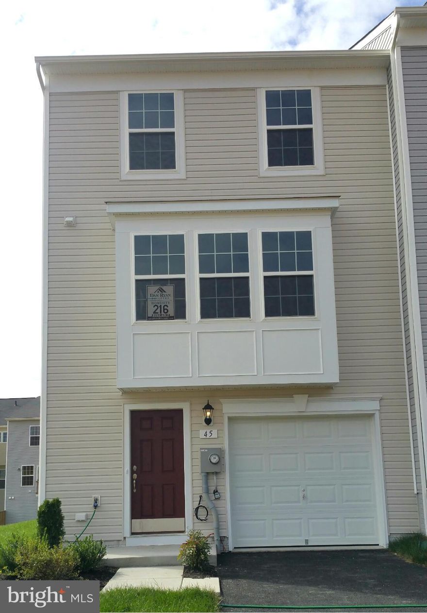 READY TO GO!!! Dan Ryan Builders at Stonebrook Village offers a new set of York II garage townhomes. Stylish end unit with living room box bay & over 2300 finished sq ft.,12' sunroom off of the island kitchen featuring stainless appliances, huge master suite with deluxe bath, double room finished walkout lower level with bath rough-in & lots of upgrades. Ask about closing cost help!