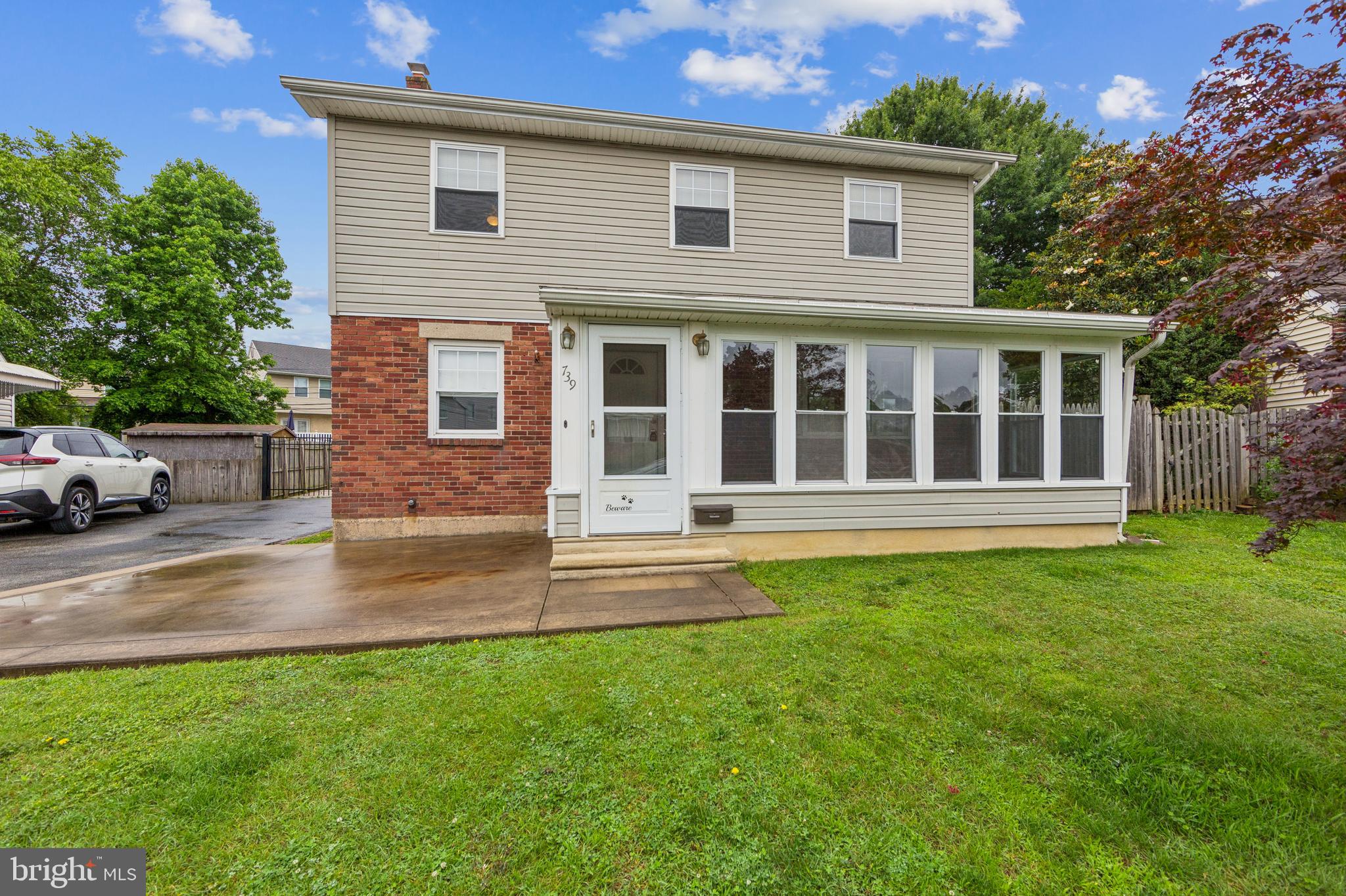 Welcome to this spacious and beautifully maintained two-story Colonial, perfectly situated in a prime location just minutes from the train, airport, shopping, and major highways. This charming home features an inviting enclosed front sunporch, leading into a generously sized living room and formal dining room—ideal for entertaining. The main level includes a convenient first-floor full bath, a bright and updated kitchen with sleek countertops, modern appliances, and a gas stove, plus a cozy family room and a dedicated office—perfect for today’s flexible lifestyle.Hardwood floors flow seamlessly throughout the first and second floors, complementing the sunlit rooms and classic layout. Upstairs, the large master bedroom offers a private en-suite bath, along with three additional spacious bedrooms and a hall bath.The fully finished basement provides even more living space, plus extra storage. Step outside to a large, beautifully landscaped backyard and an oversized two-car garage offering ample parking and workspace.This home also features many upgrades, including a whole-house generator, newer windows and doors, updated electric, a newer heater, and central air for year-round comfort.Don't miss the opportunity to make this perfect home yours!