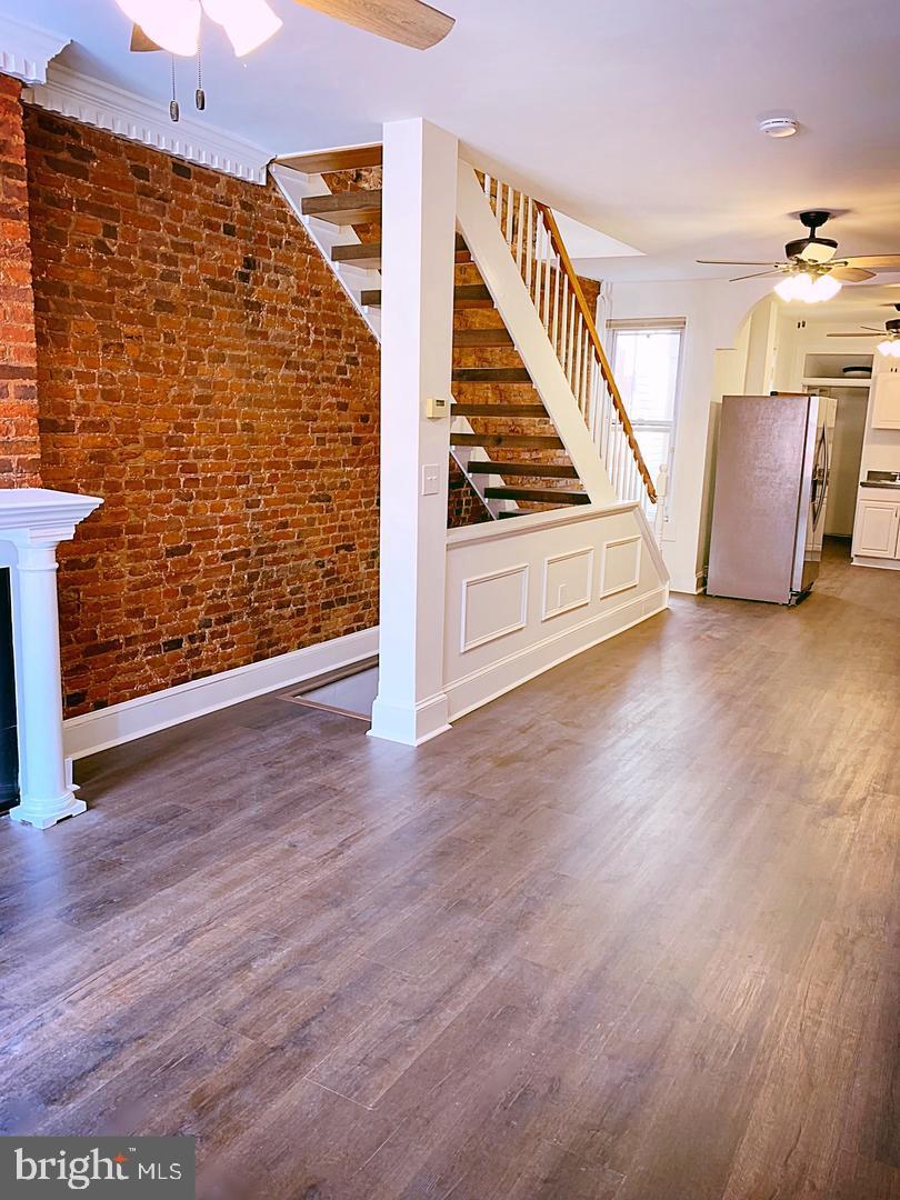 2 BR, 1.5 BATH Row home for *RENT* - large roof top deck with sweeping city views. Full fresh rehab- windows, fresh paint, appliances, hardwood floors and exposed brick. Located blocks away from the Cross Street Market, Riverside Park & Federal Hill Park. **$1,900 per month. Includes monthly cleaning*****Pets are ALLOWED with deposit***