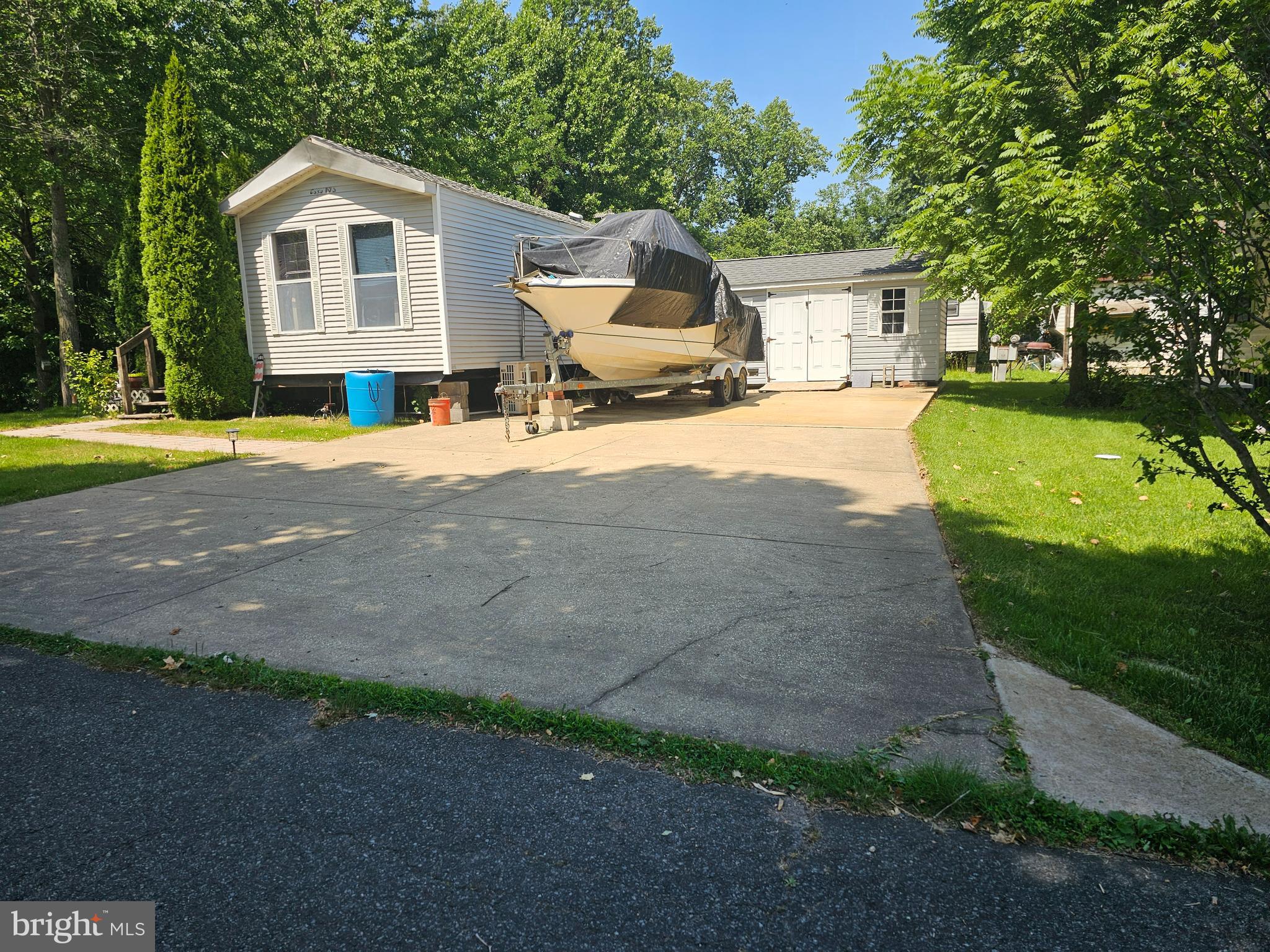 Two over sized lots with a 1995 3 Bedroom Casa Villa Park Model and shed located in GLEN 3 of Indian Acres Campground. Limited to 150 days, no more than 100 consecutive days (not a full time residence). Open year round. So much to do in this community with a lake, two ponds, and a boat ramp to the Sassafras/Chesapeake Bay. Events, convenience store, arcade, pools, and more. Come check out all this gated community has to offer as we look forward to meeting you.