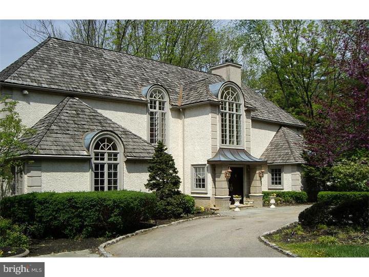 This impressive French Manor home sits on 1.74 landscaped acres in desirable Gladwyne. This custom home features 5 bedrooms, 4 full and 2 partial baths. A two- story grand foyer with coffered ceilings, leads into a beautifully appointed first floor living space. Gourmet kitchen with custom cabinetry, granite countertops, top-of ?the- line appliances, a center island and breakfast area opens to an expansive family room with vaulted ceilings and stone floor to ceiling wood burning fireplace. Spacious Living Room, Dining Room, Library with custom built-ins, powder room, laundry room, first guest/master suite with adjoining office/sitting room complete the first floor. Second floor boasts a large master bedroom suite with vaulted ceiling, large dressing area with generous closets and white marble master bath overlooking the private rear wooded yard. Additional 2 bedrooms share a jack & jill bath, an expansive 4th bedroom with and en-suite bath and rear stairs complete the second floor. Minutes from center of Gladwyne!!! Easy to show!!!!! (Owner is a licensed PA real estate agent)